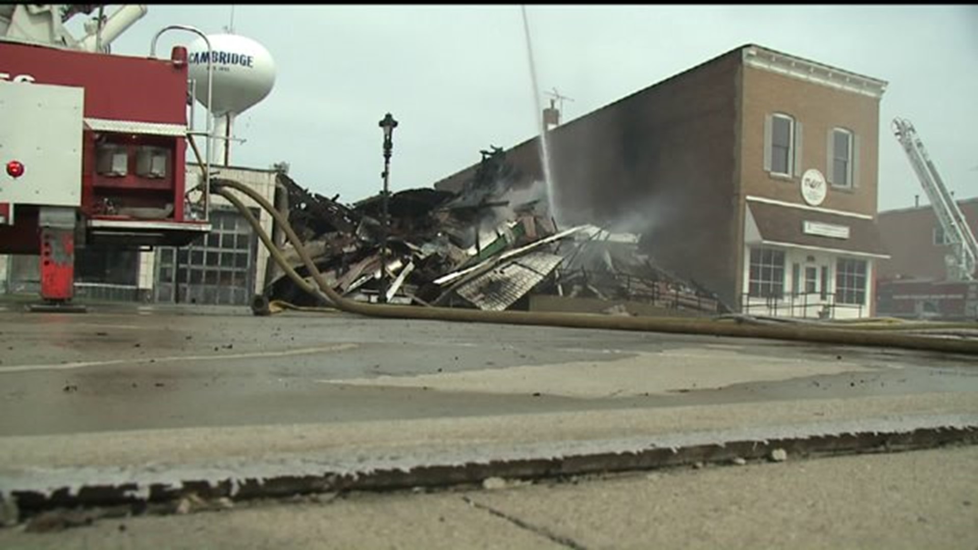 Man rescued from burning building in downtown Cambridge, Illinois