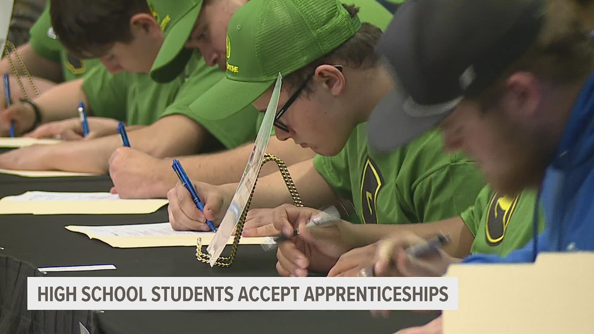 More than 60 students signed letters of intent on Wednesday to formally accept an apprenticeship. Nearly two dozen area companies made the positions available.