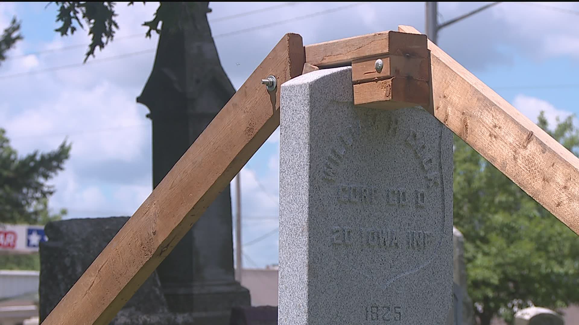 The new headstone was erected at Davenport City Cemetery, the oldest in Scott County