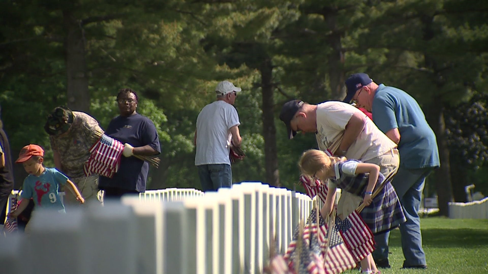 Volunteers Place Flags at Arsenal Cemetery