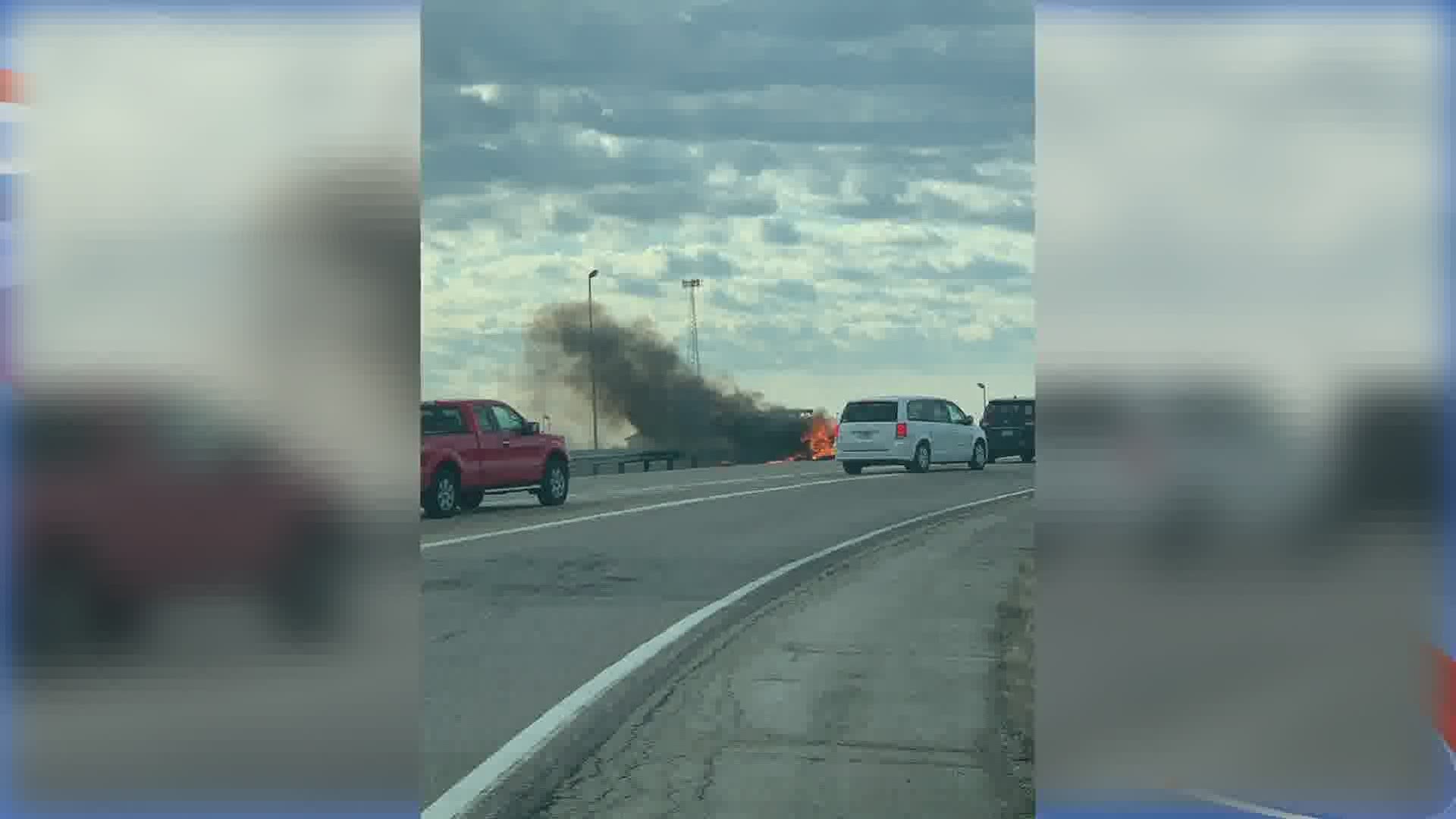 State police say three people died when a small plane crashed and burst into flames on Interstate 55 in central Illinois.