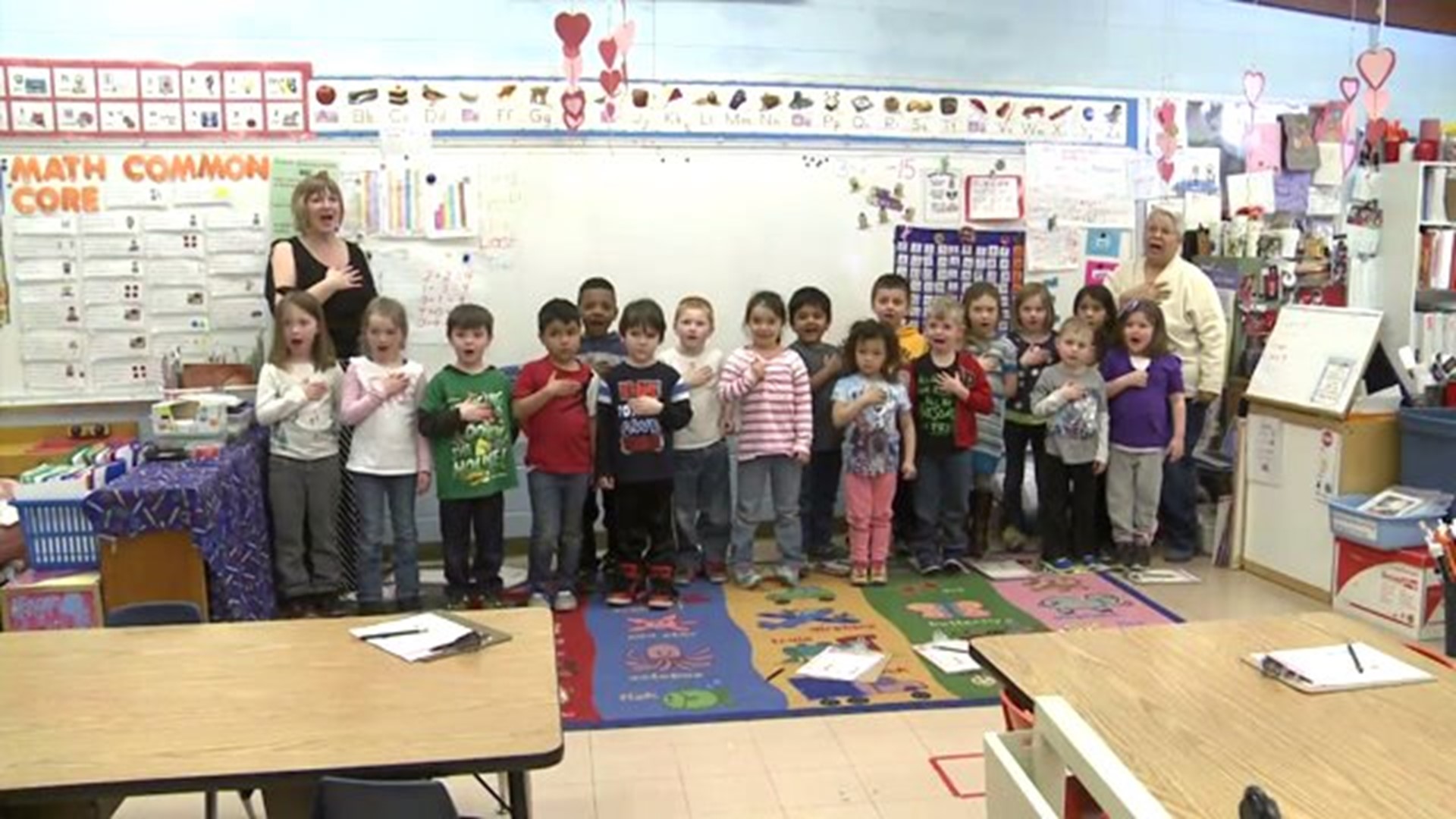 Mrs. Seggebruch`s class says the Pledge of Allegiance