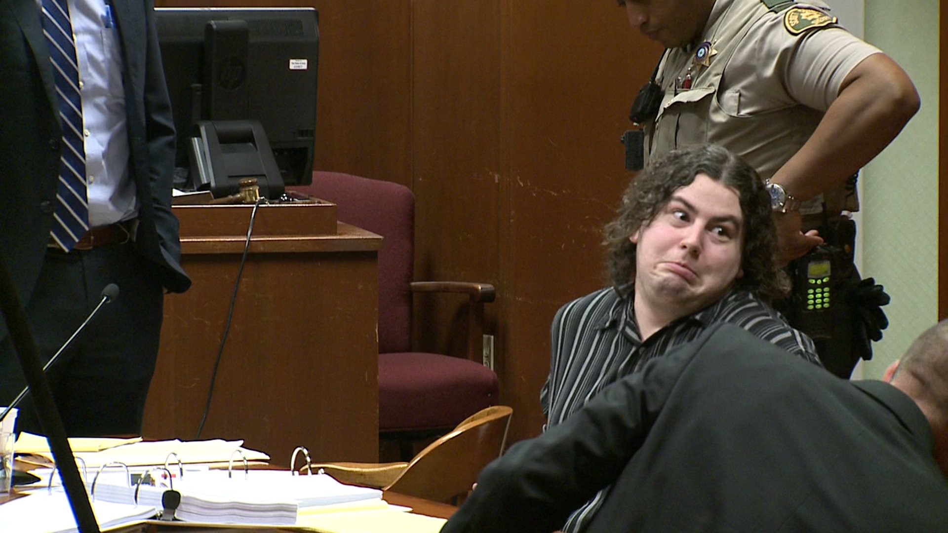 Sean Freese makes faces at the audience during trial for his parents murder