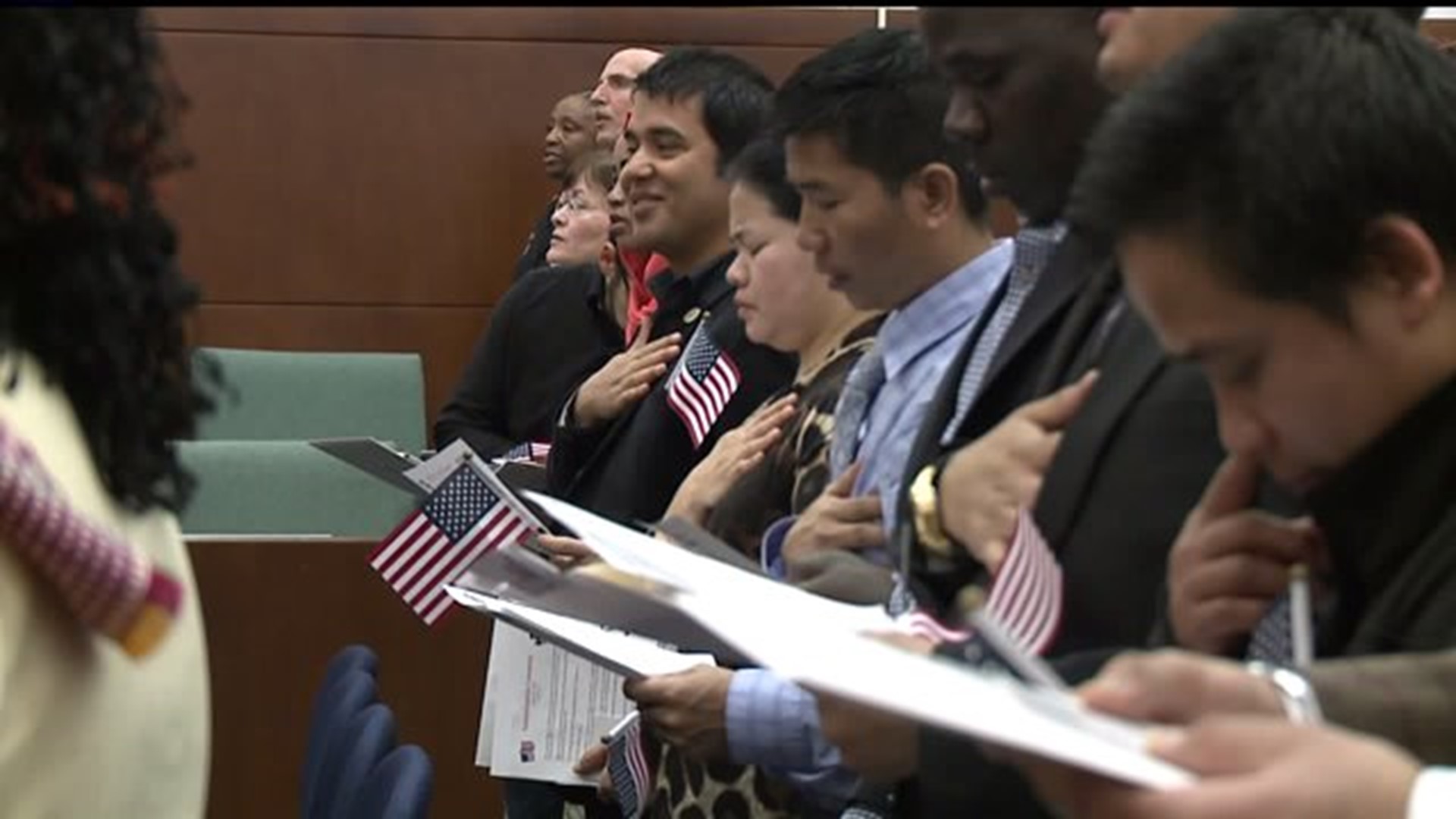New American Citizens Take Oath At Naturalization Ceremony Wqad