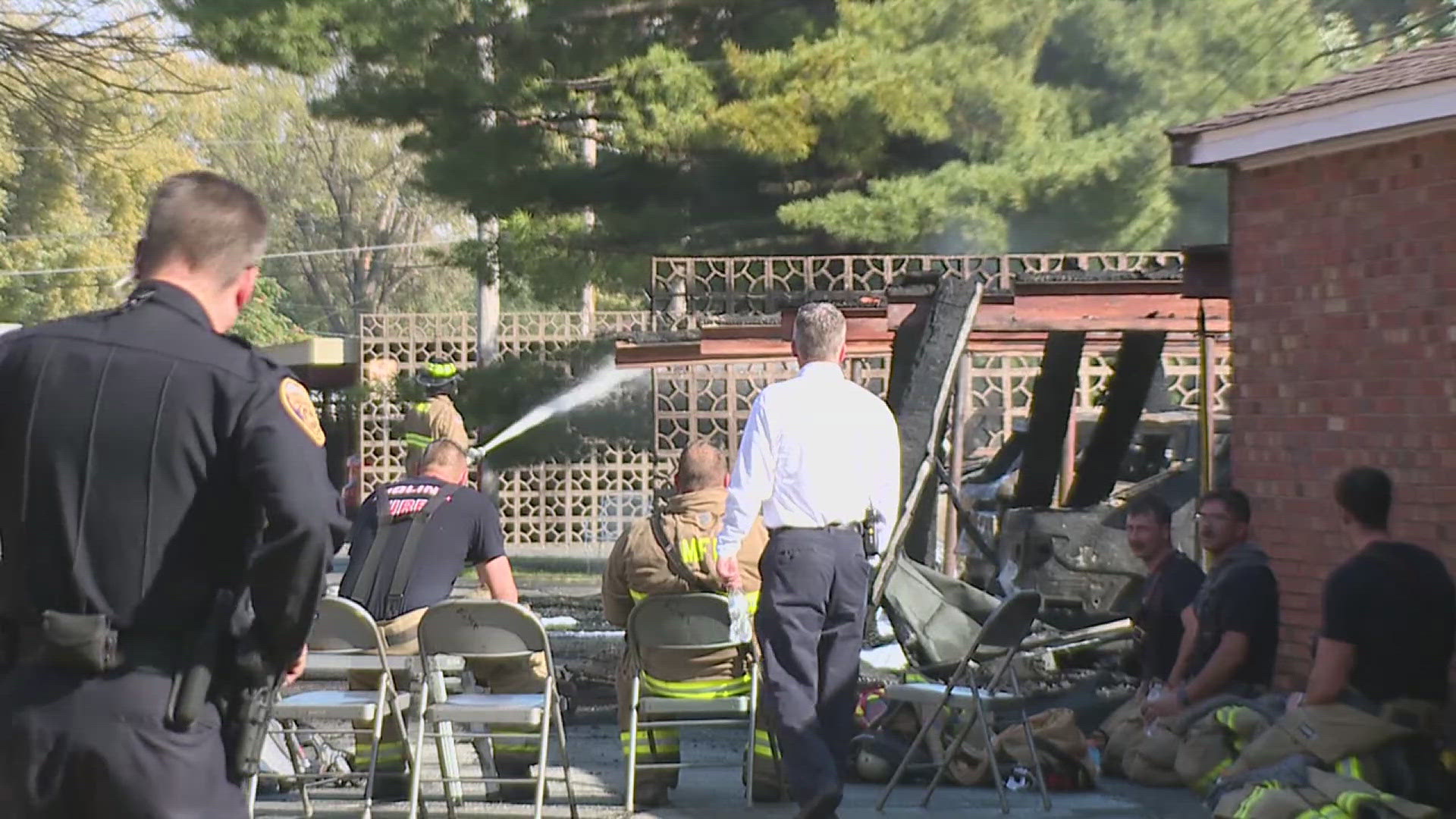 Moline firefighters are investigating a Wednesday carport fire that left several cars destroyed.