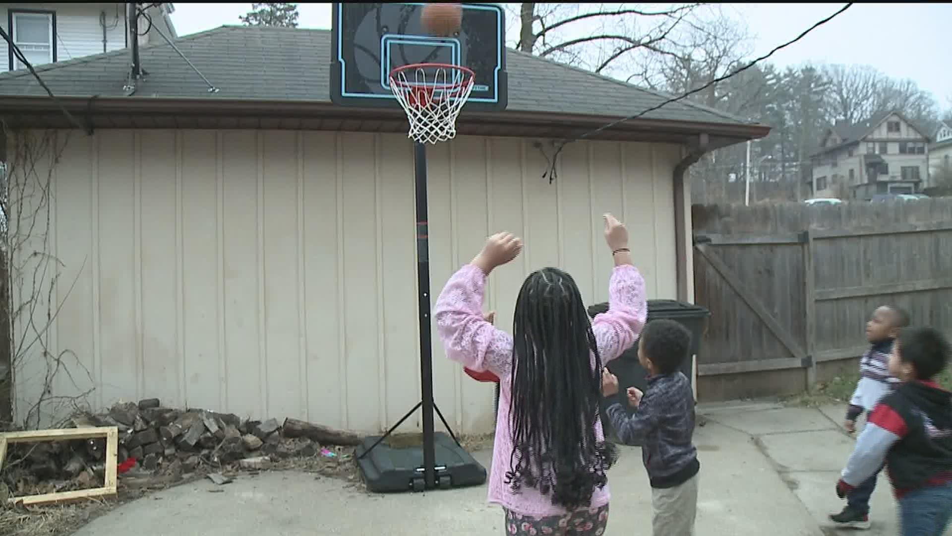 A local Rock Island mom has opened her doors two kids in the community, becoming the "mom" in their life.