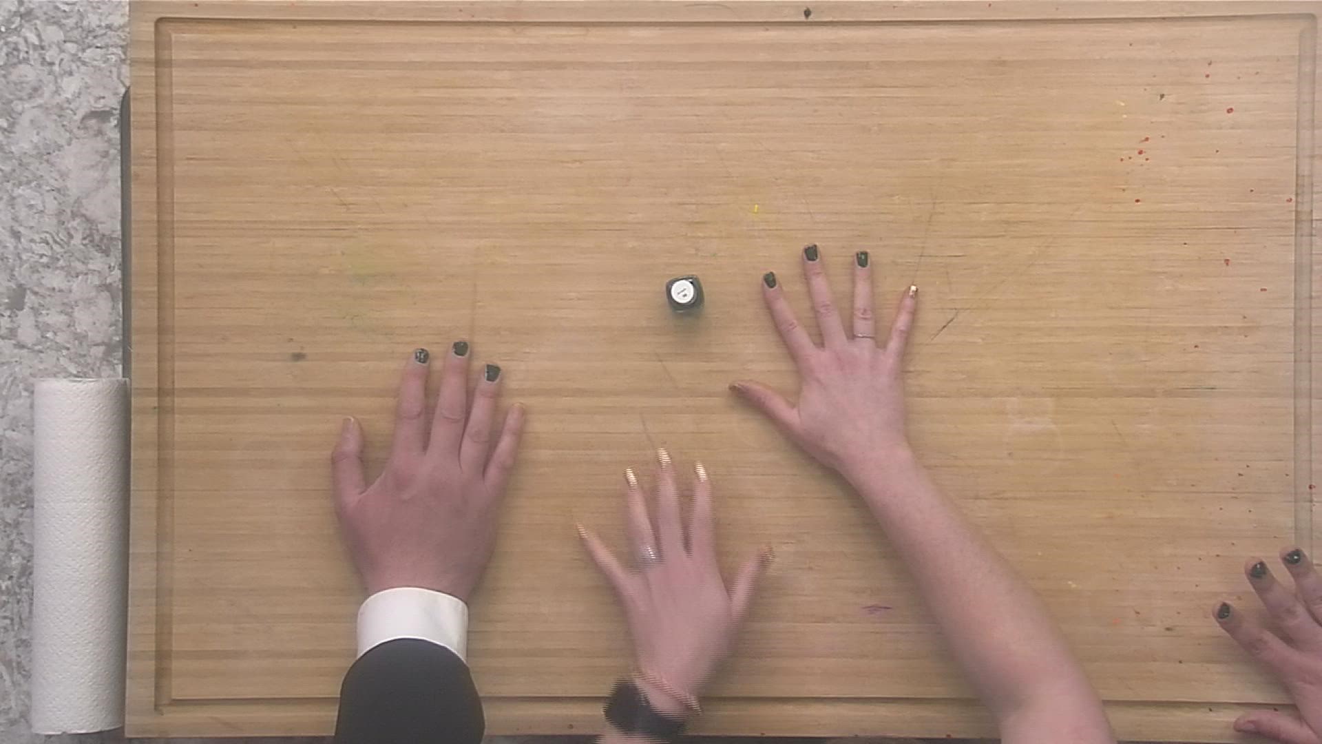 What happens when you put on green nail polish, then step in front of our green weather wall?