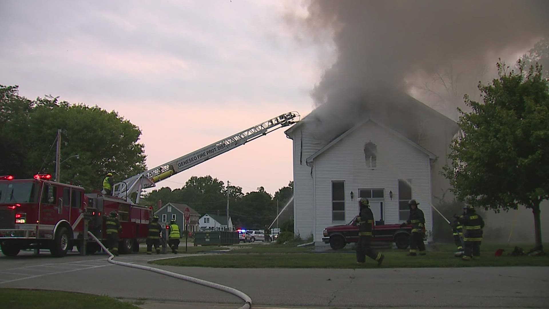 Flames leaked out the roof of a Geneseo home after a fire broke out Wednesday evening.