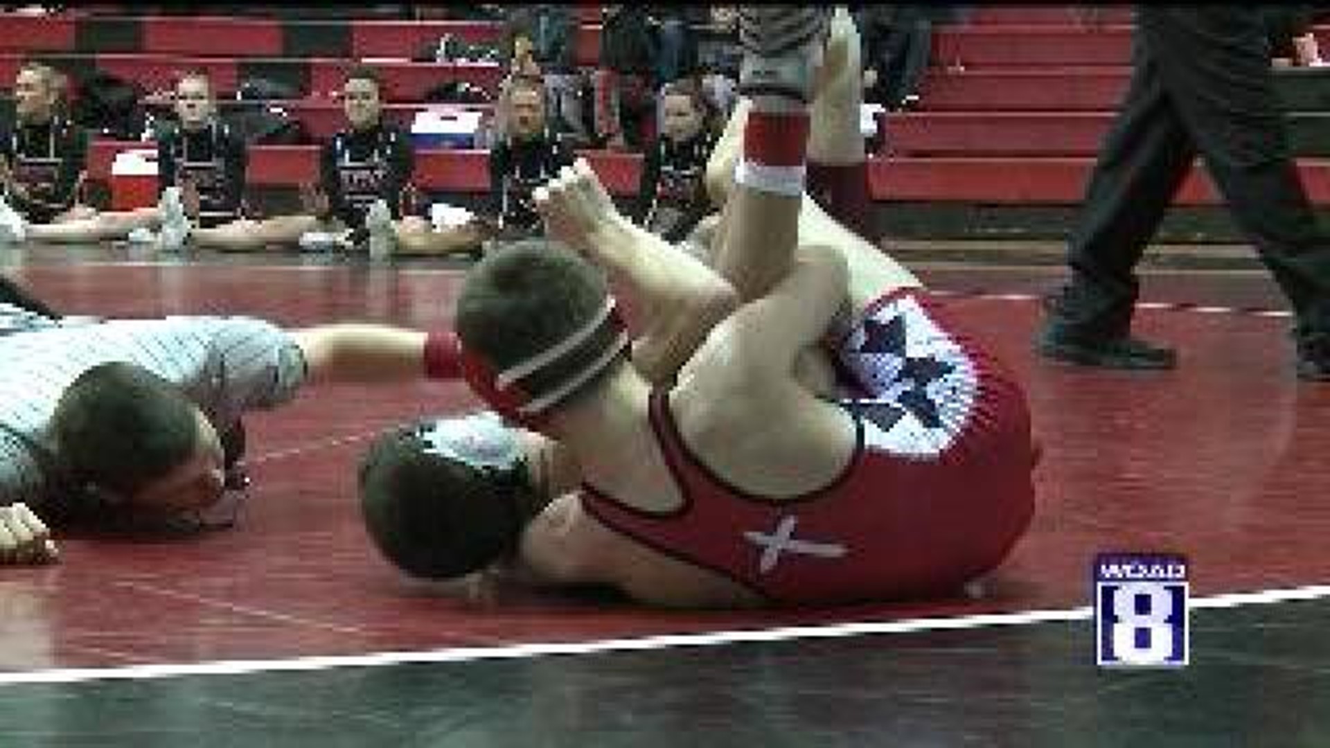 Assumption Grapplers Punch Ticket to State