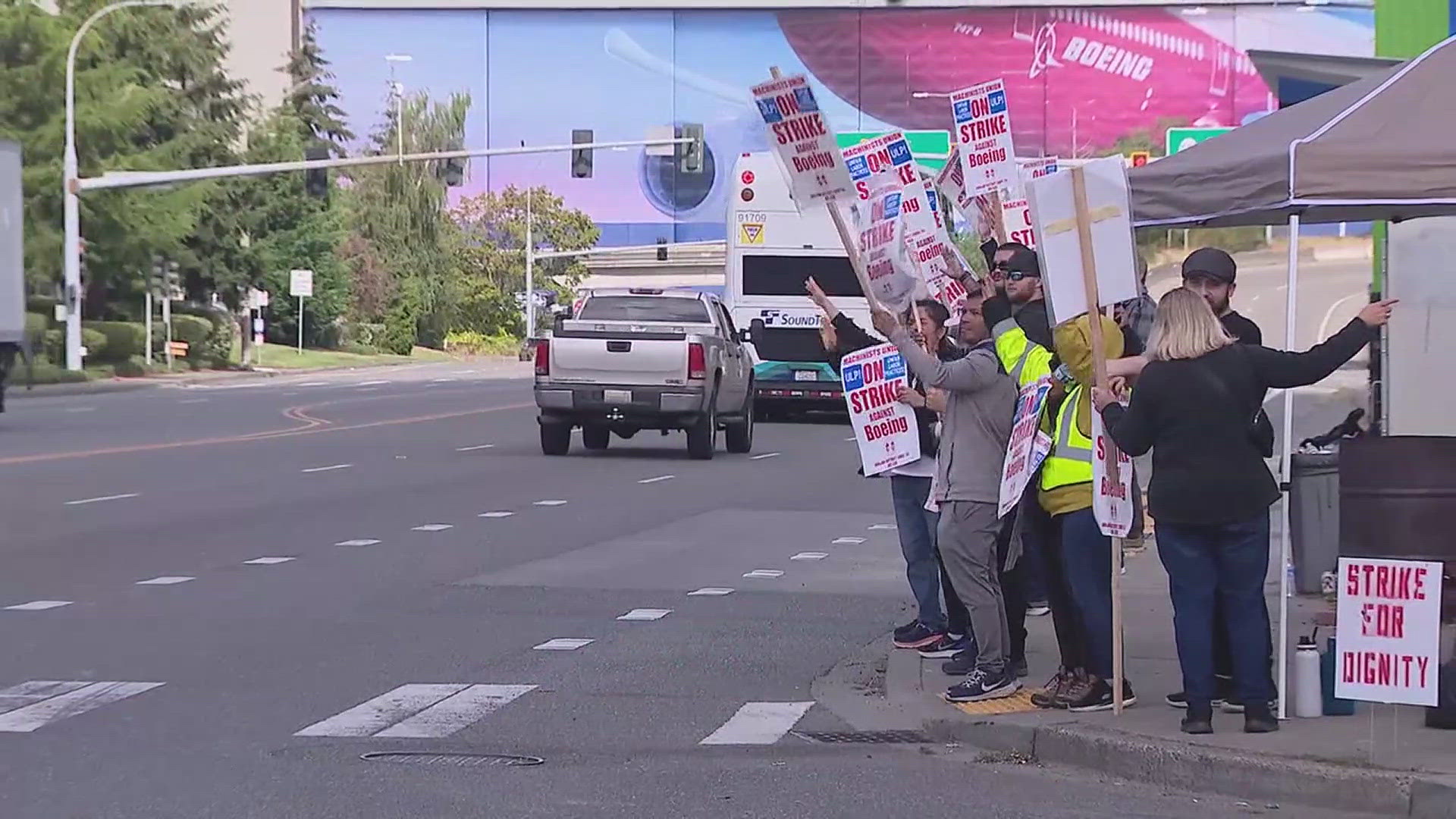 In response to the number of laborers protesting their contracts, Boeing is considering temporary layoffs to cut costs.