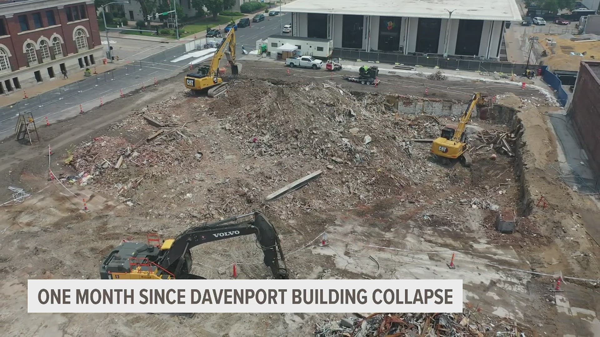 Bricks and other remaining debris fill the foundation walls of the building that stood for over a century.