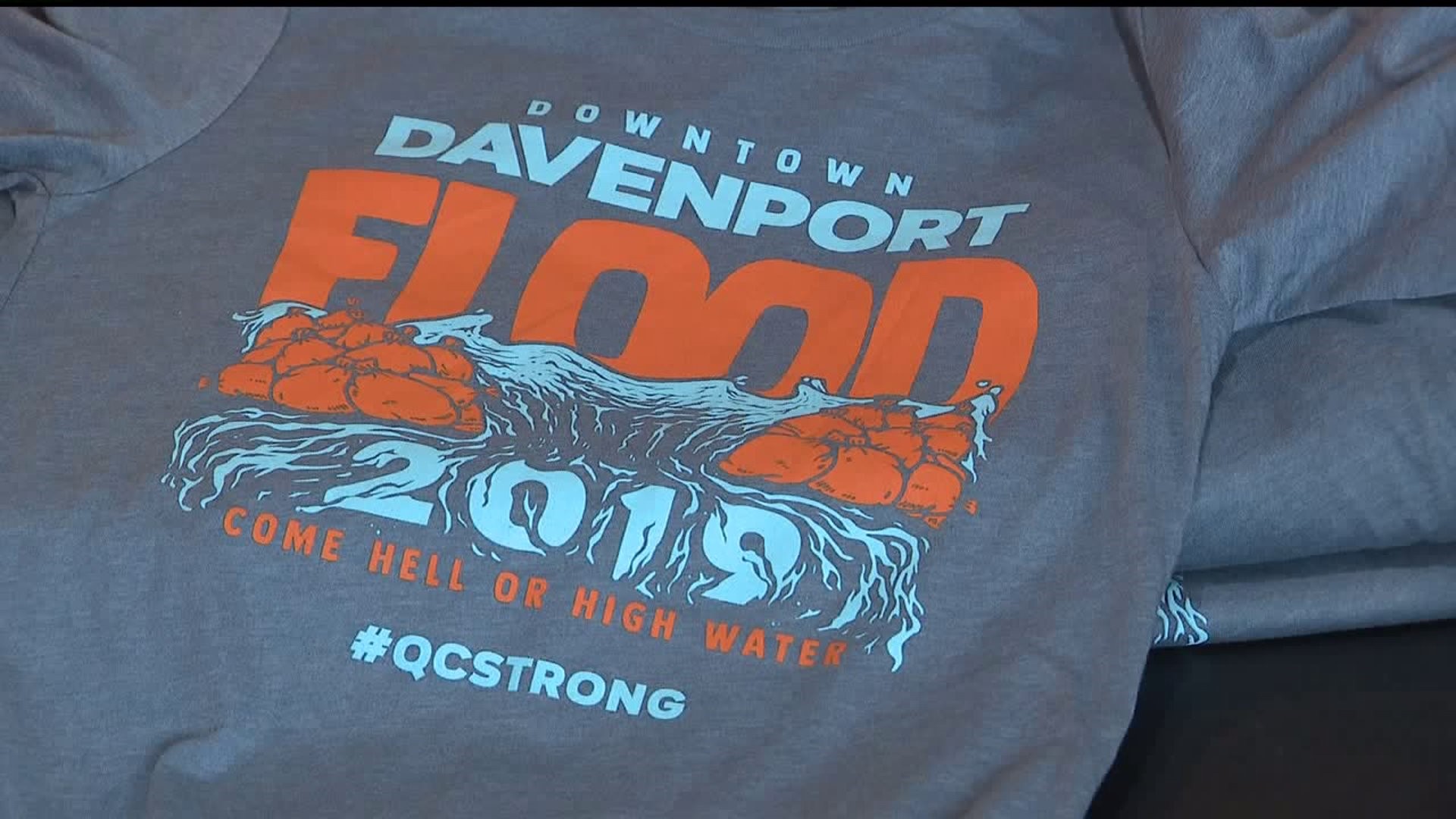 QC flood t-shirts help benefit flooding victims