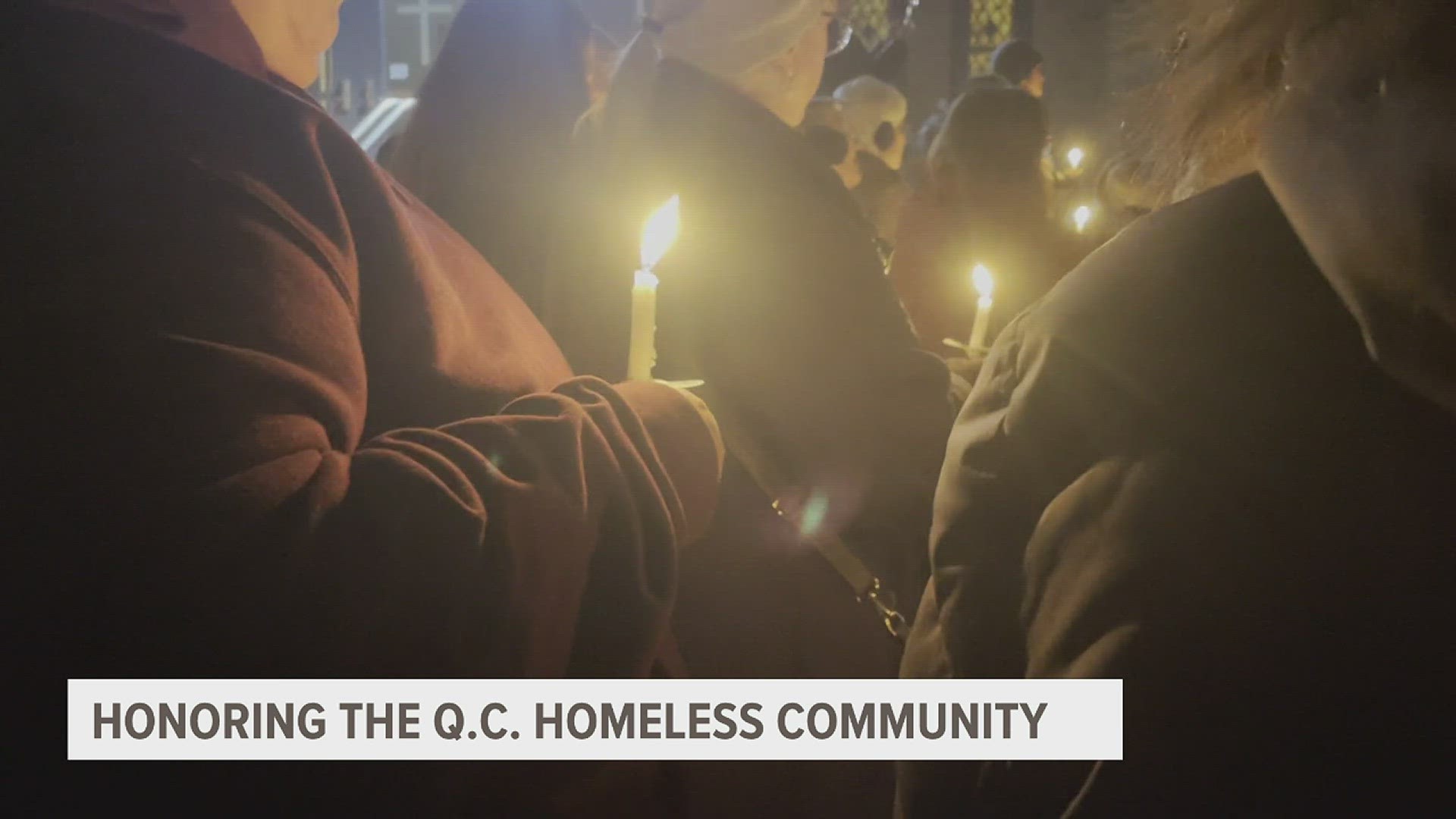 In addition to songs, speeches and prayers, attendees lit candles as the names of those who have died were read, each name followed by one ring of the church bell.