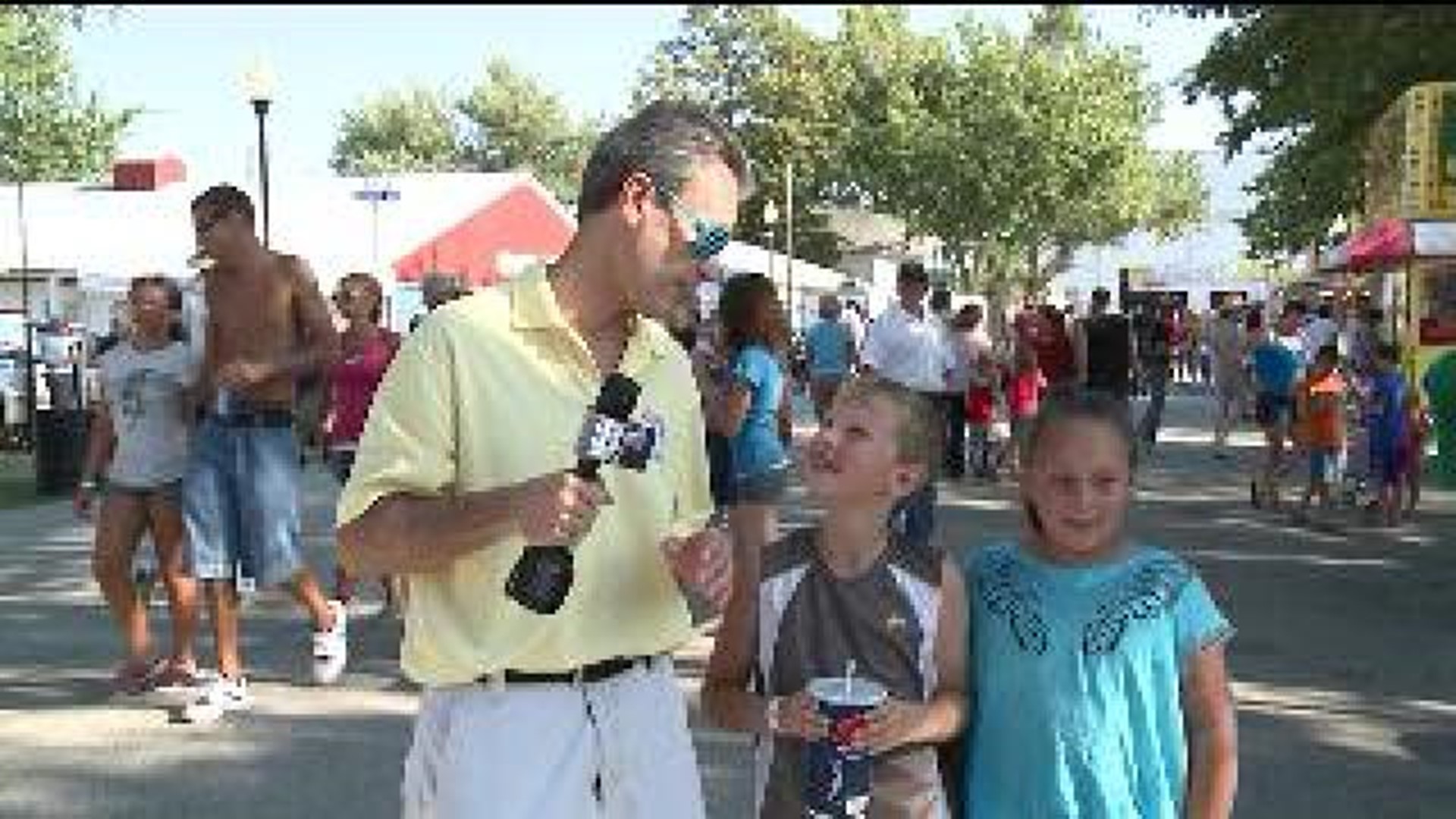 Terry interviews Cooper and Haley at the fair