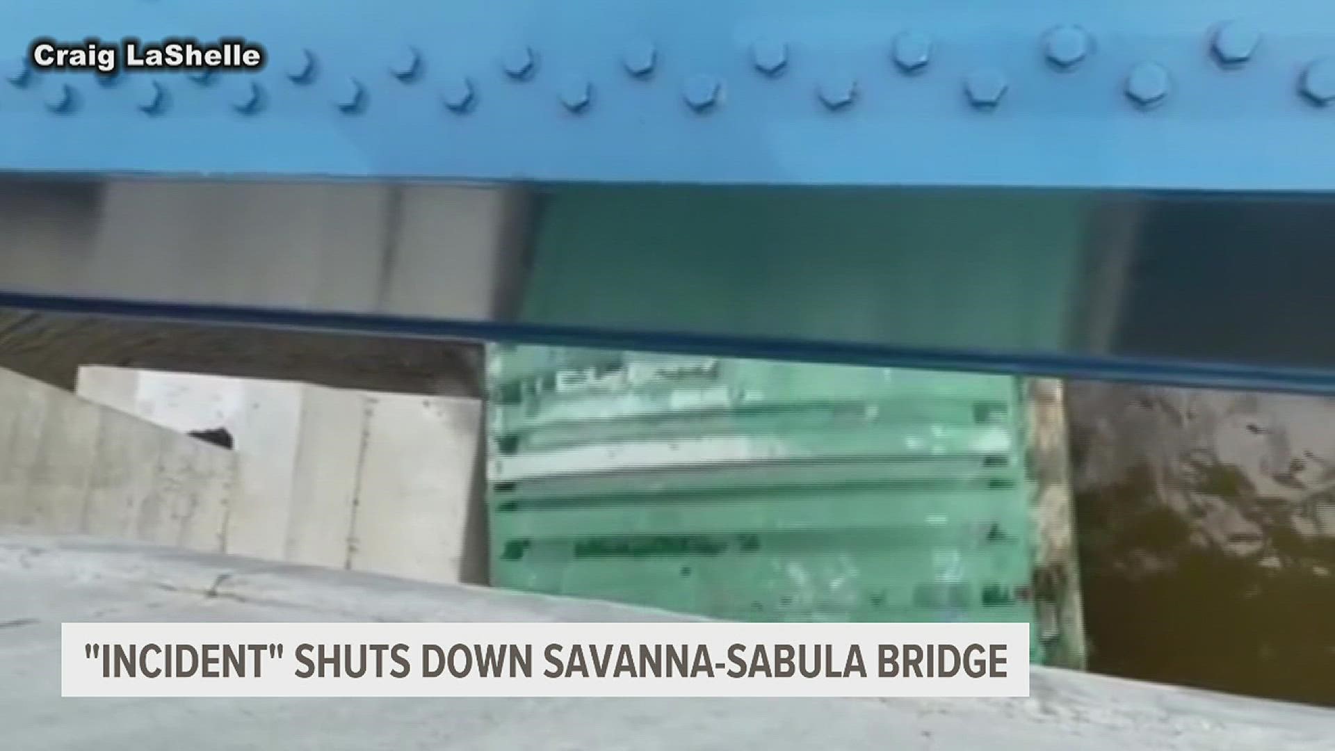 The bridge was closed for about three hours after several barges broke free from their tow and struck the support pillars Sunday morning.