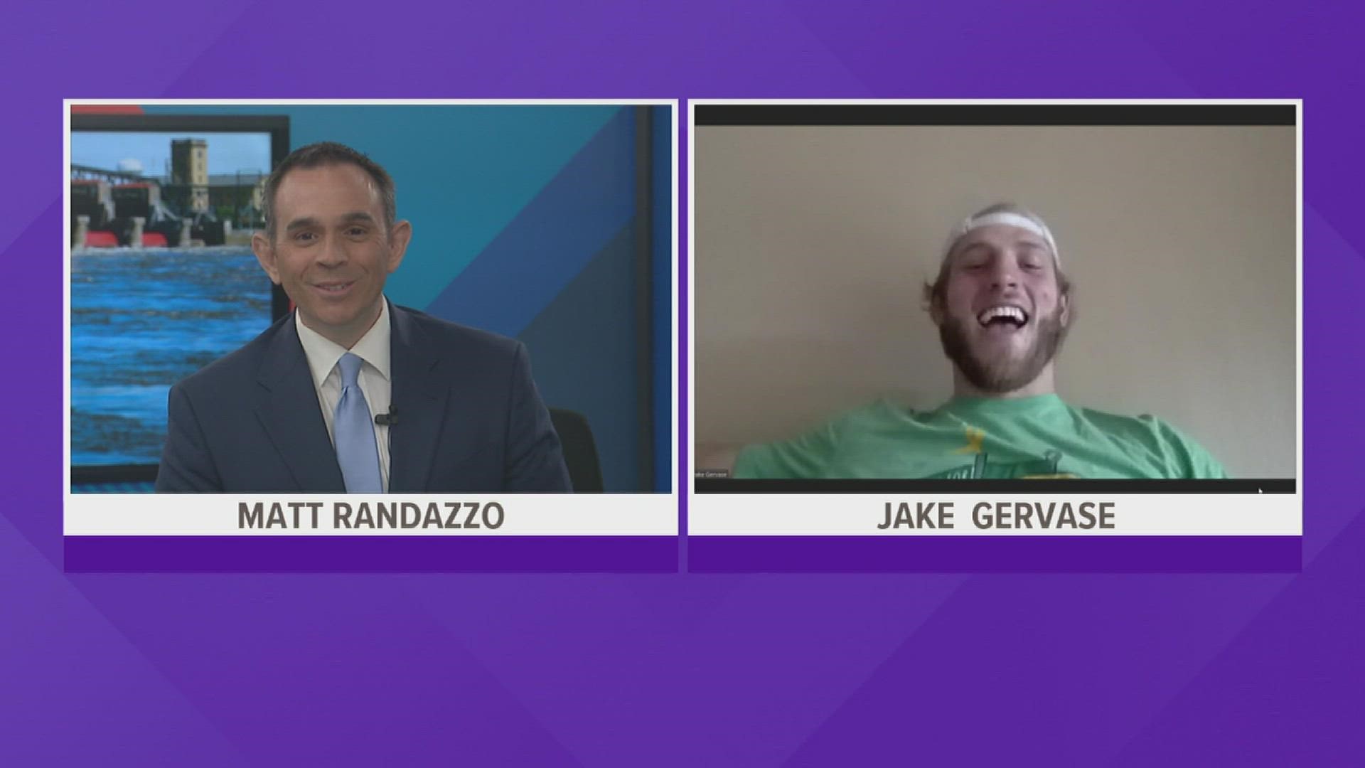 Matt Randazzo talks with Jake Gervase from the L-A Rams as he gets ready for the Super Bowl.