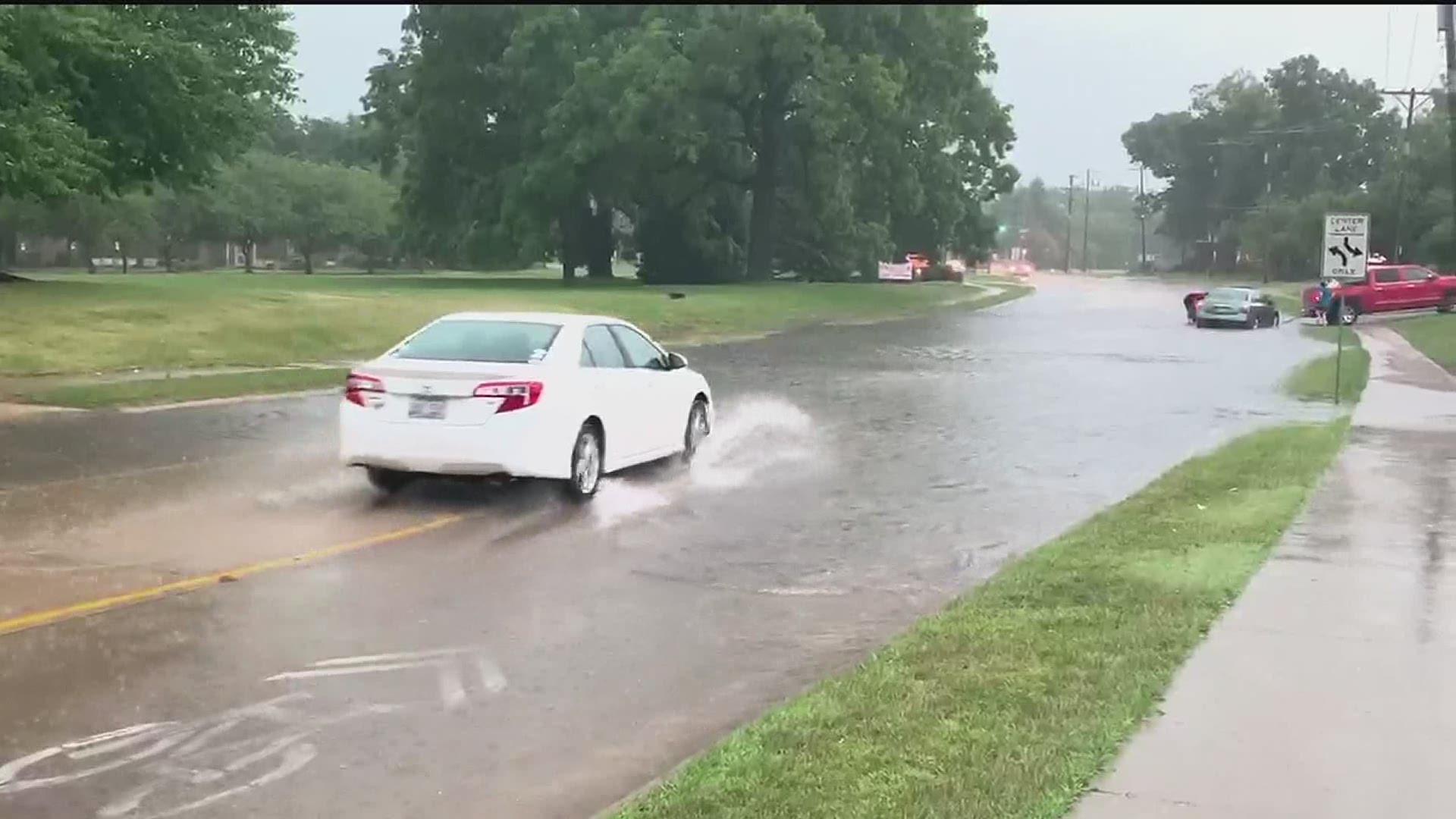 Moline Flooding submerges car July 9