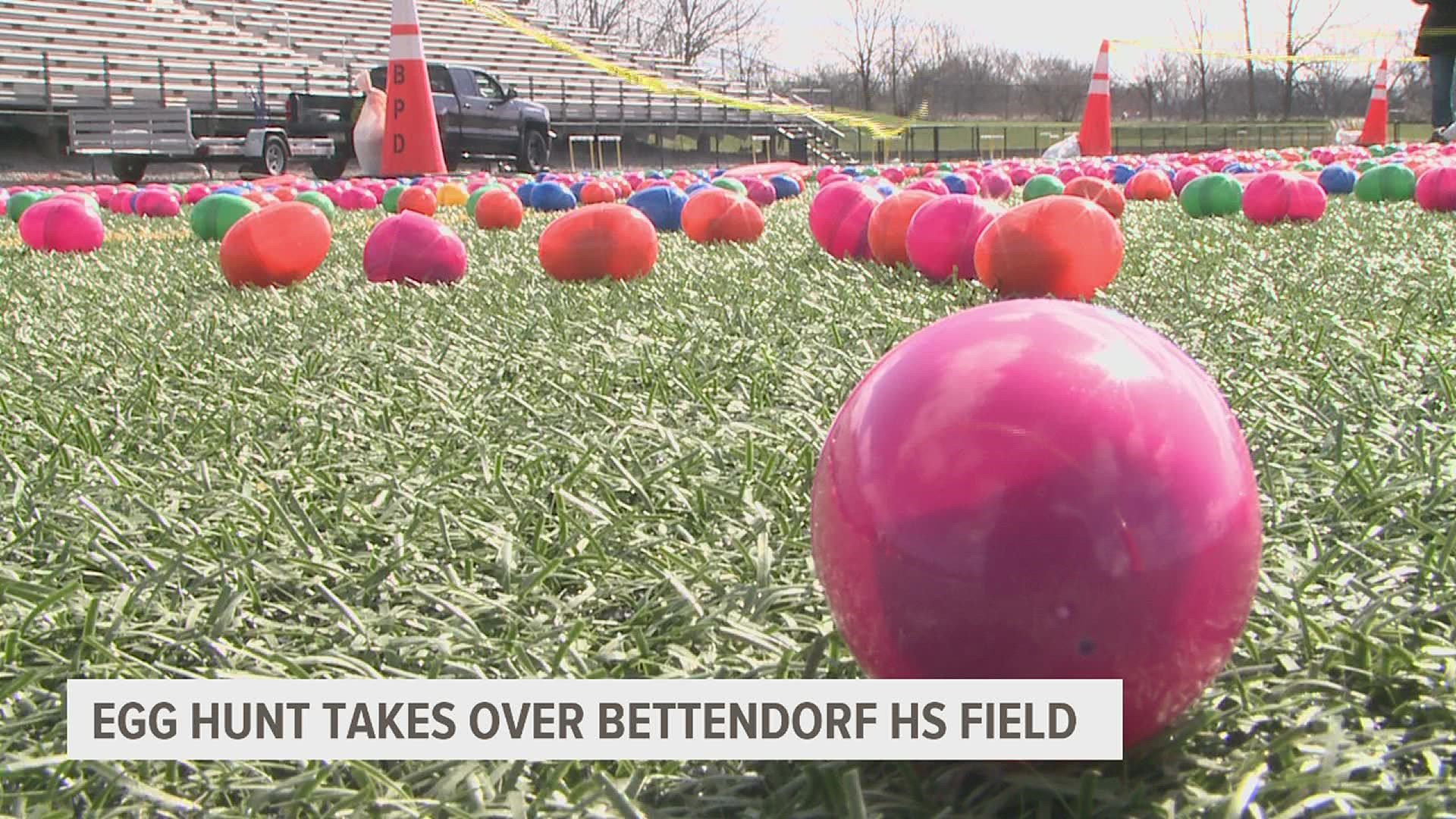 Kids took to the Bettendorf High School football field to collect over 15,000 eggs carrying candy and gift cards.