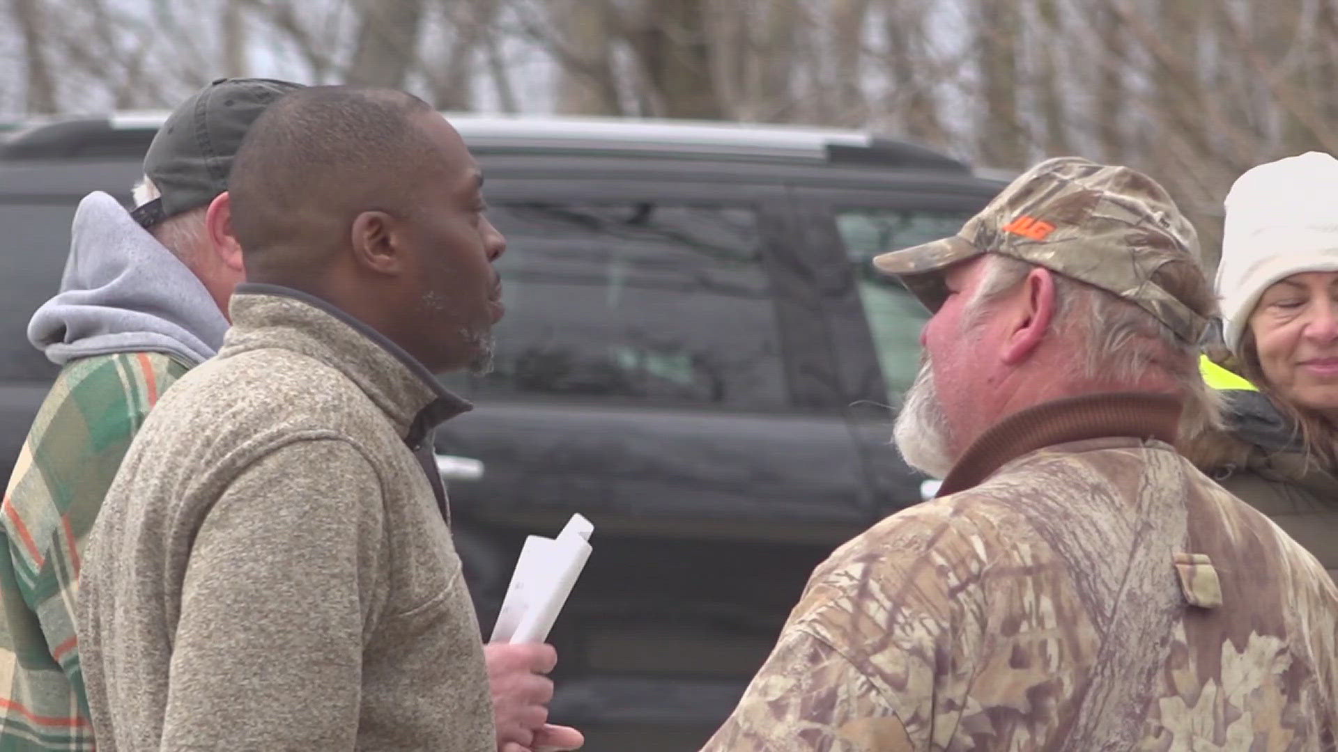 Community members were gathered to protest a planned truck stop and dispensary on the land.