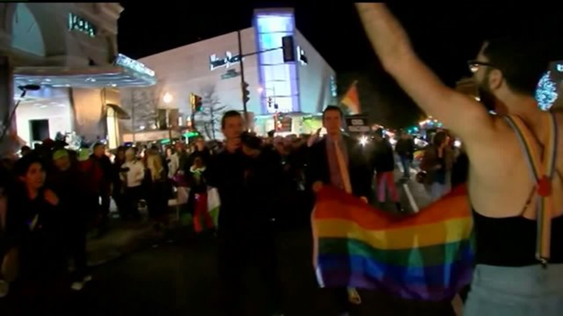Pro-LGBT rights protesters dance to Mike Pence`s home