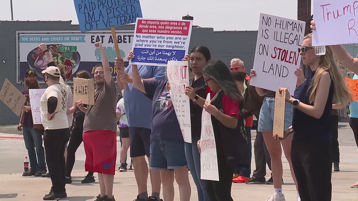 Demonstrators rally against ICE in Davenport, spurred by LA protesters