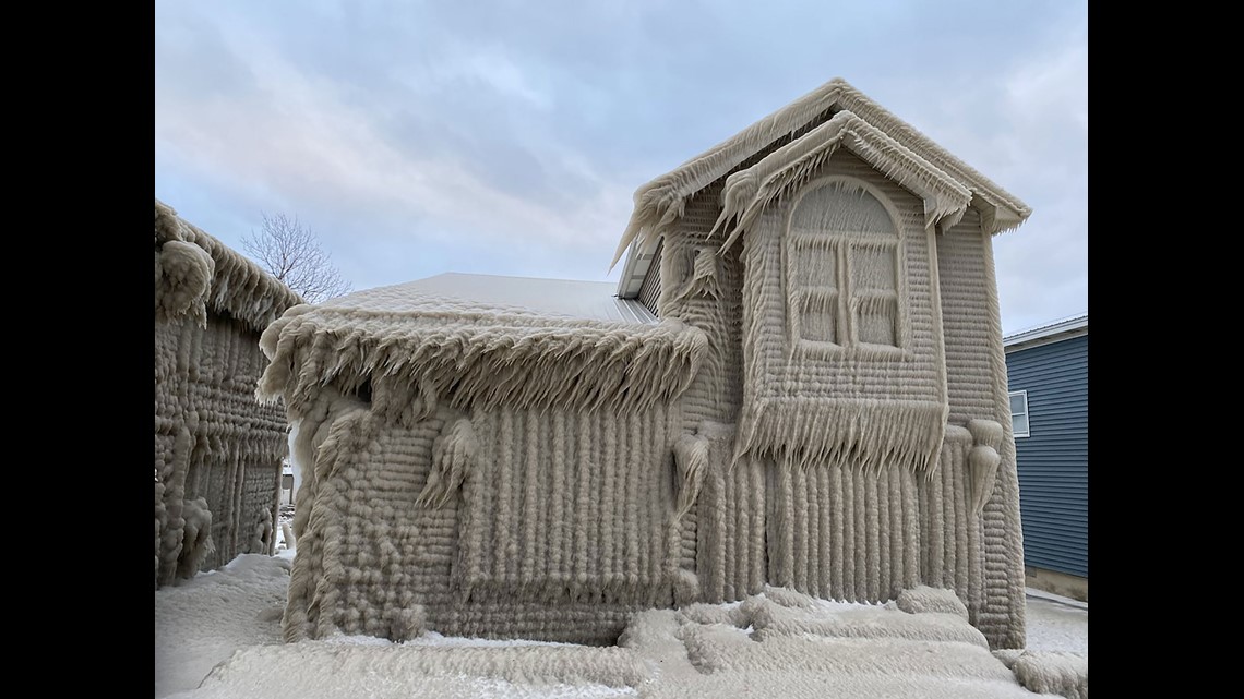 Homes along Lake Erie are covered in ice following two days of gale