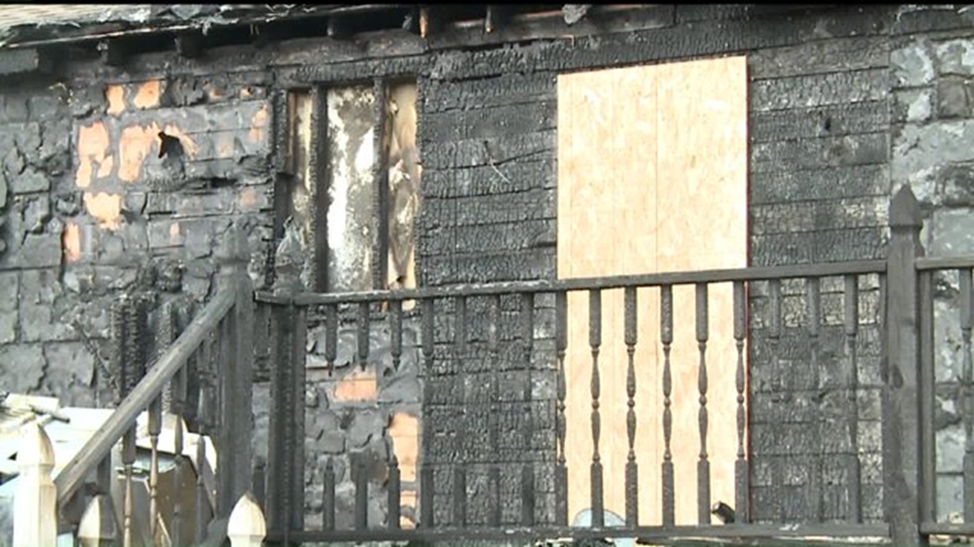 Deck fire destroys back of house in Colona