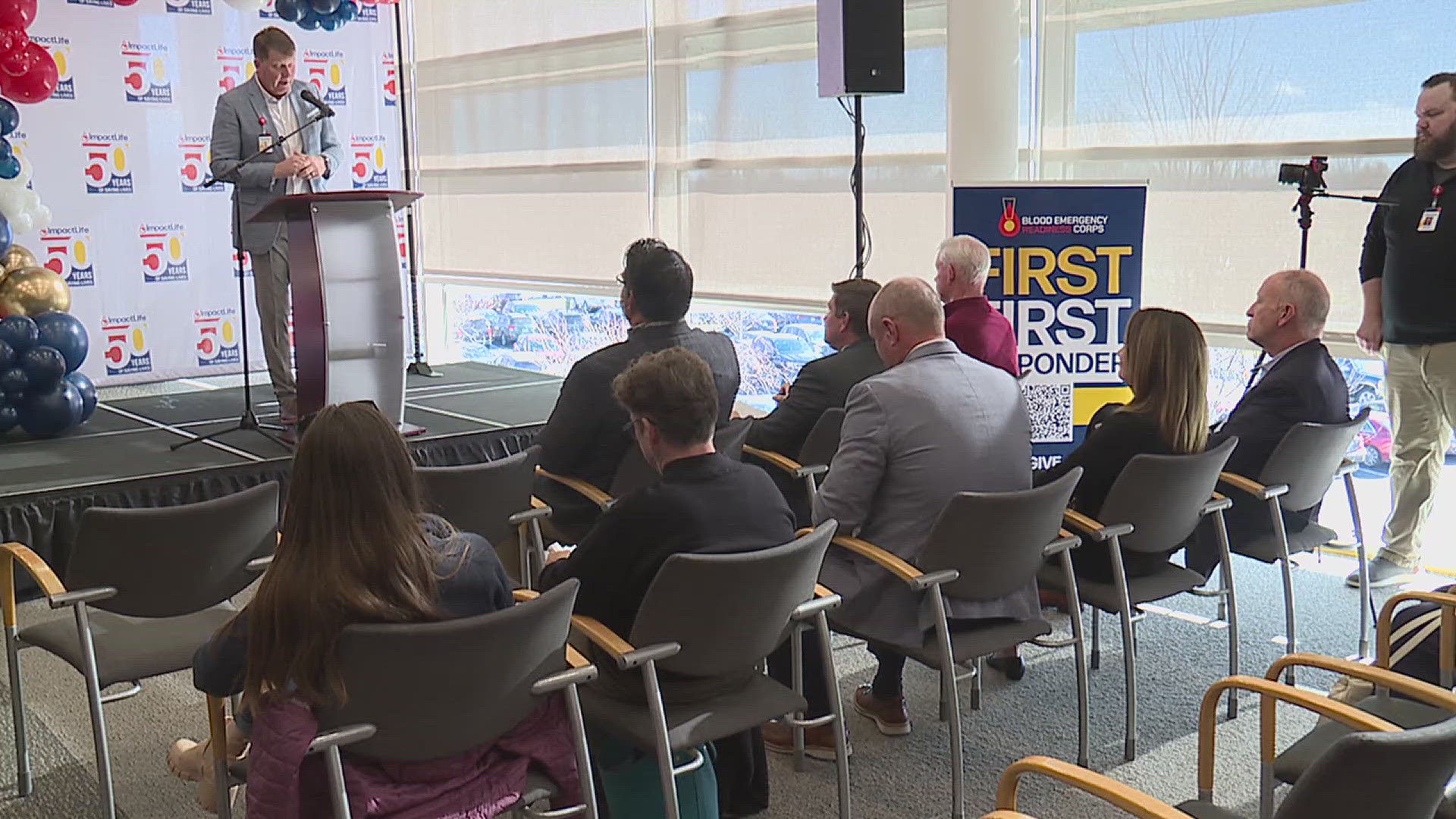 The organization held an event at its Davenport headquarters on Tuesday, which included families of blood transfusion recipients.