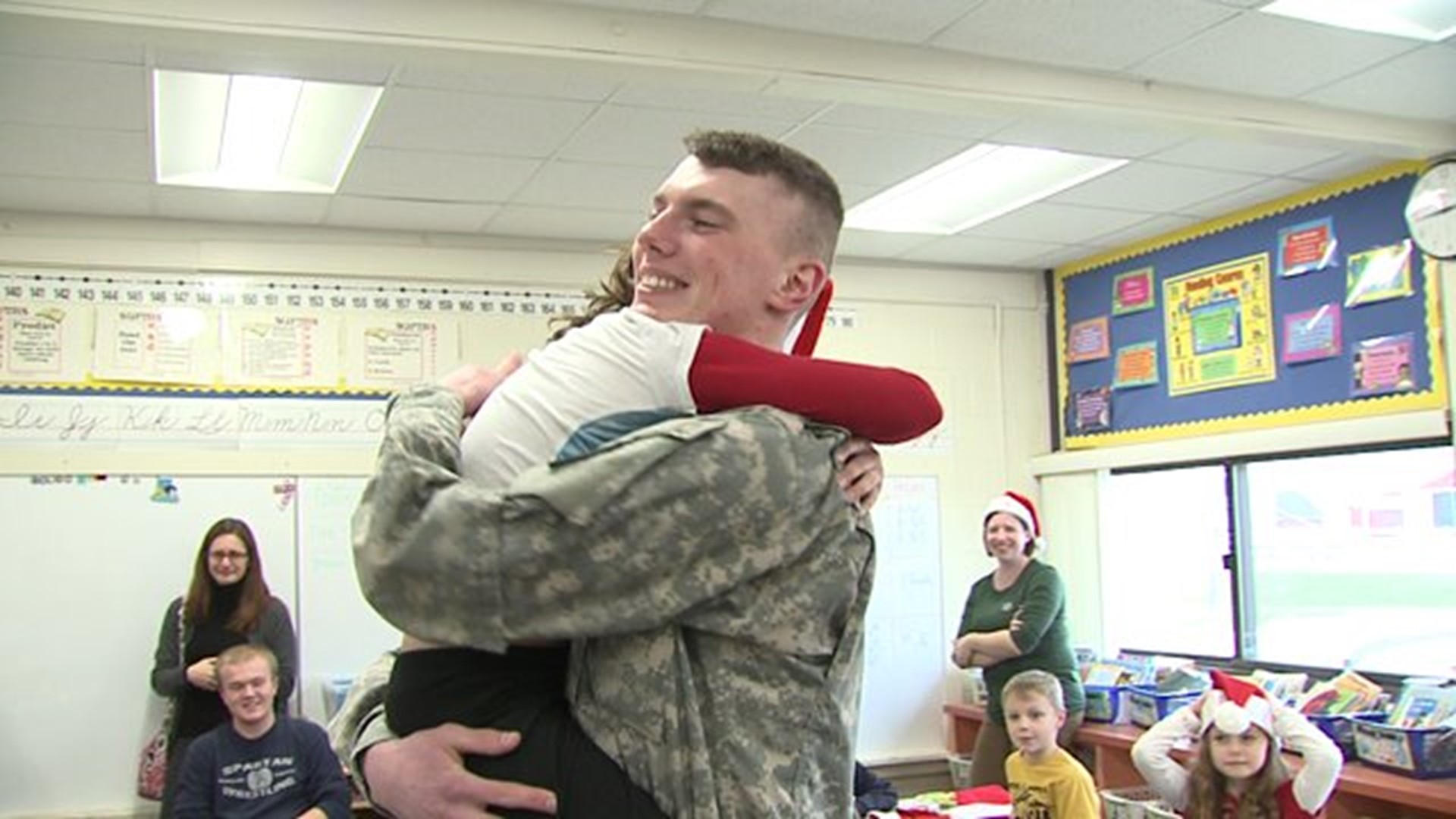 Soldier reunites with brother and sister for a holiday surprise