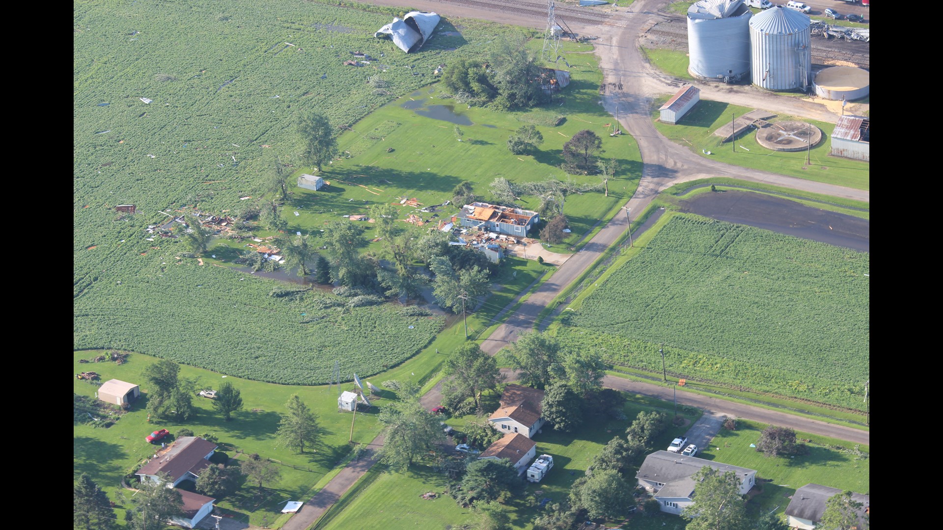 Crews continue cleaning streets of Cameron, Illinois; utilities being
