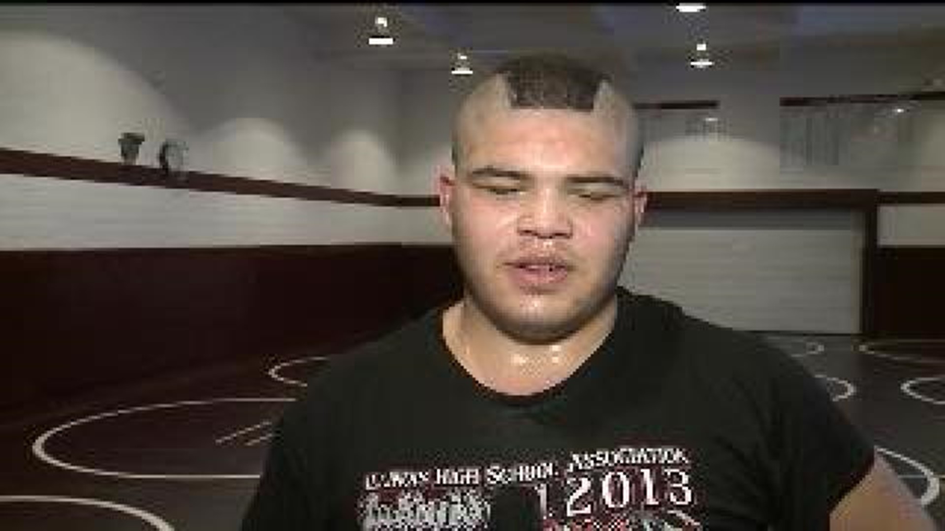 Teen fights mystery disease to be wrestler