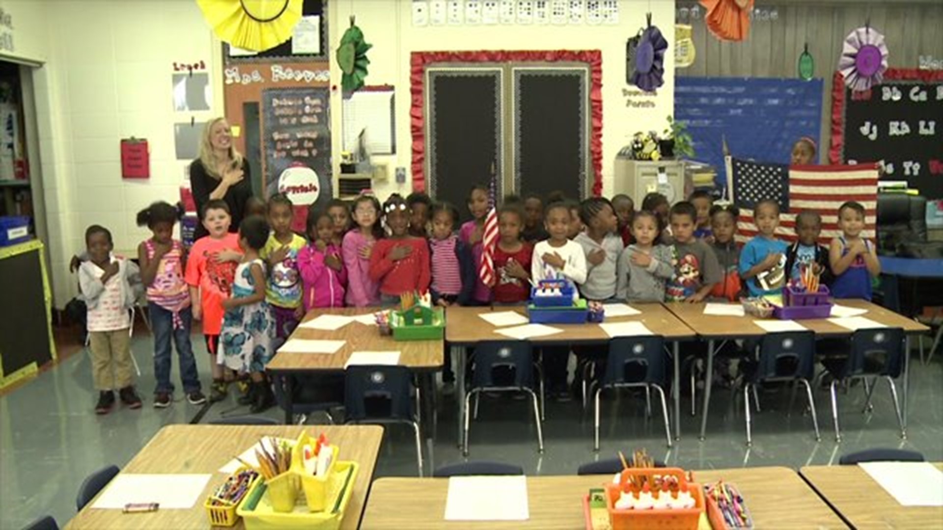 Mrs. Reeves` class says the Pledge of Allegiance