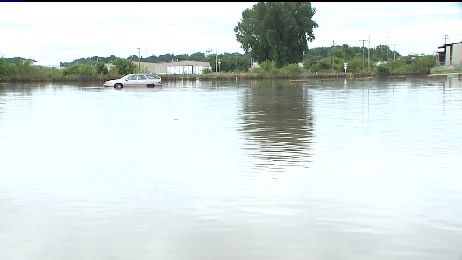 flooding in Clinton buries business` basement