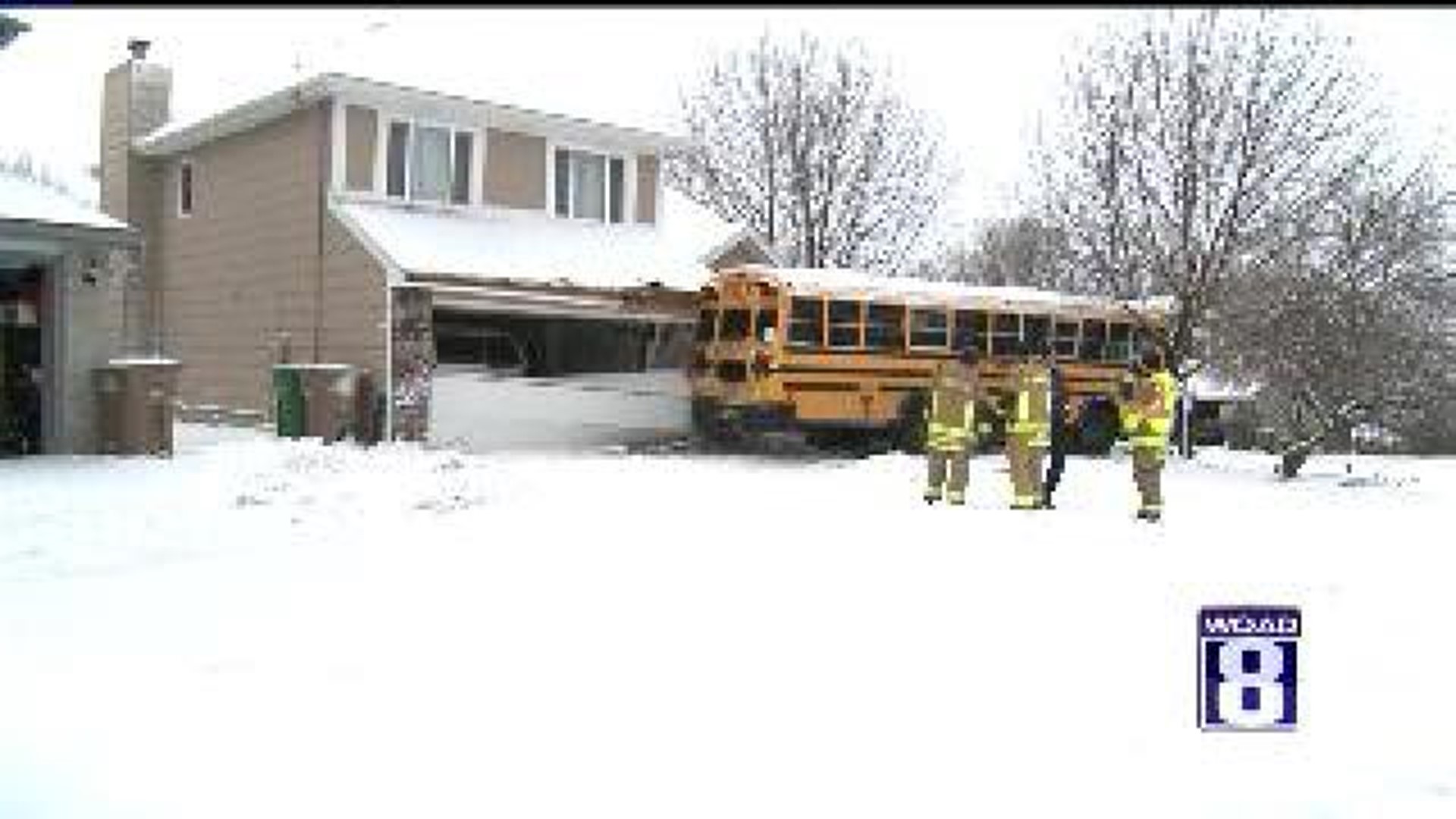 Bus hits house during commute to school