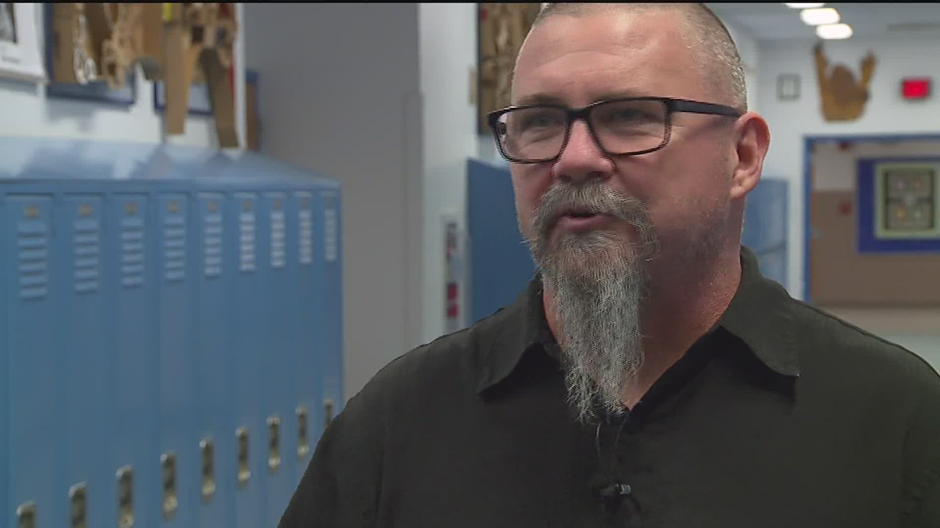 Geneseo Middle School teacher Mr. Eaker uses rock and roll music to connect with kids.