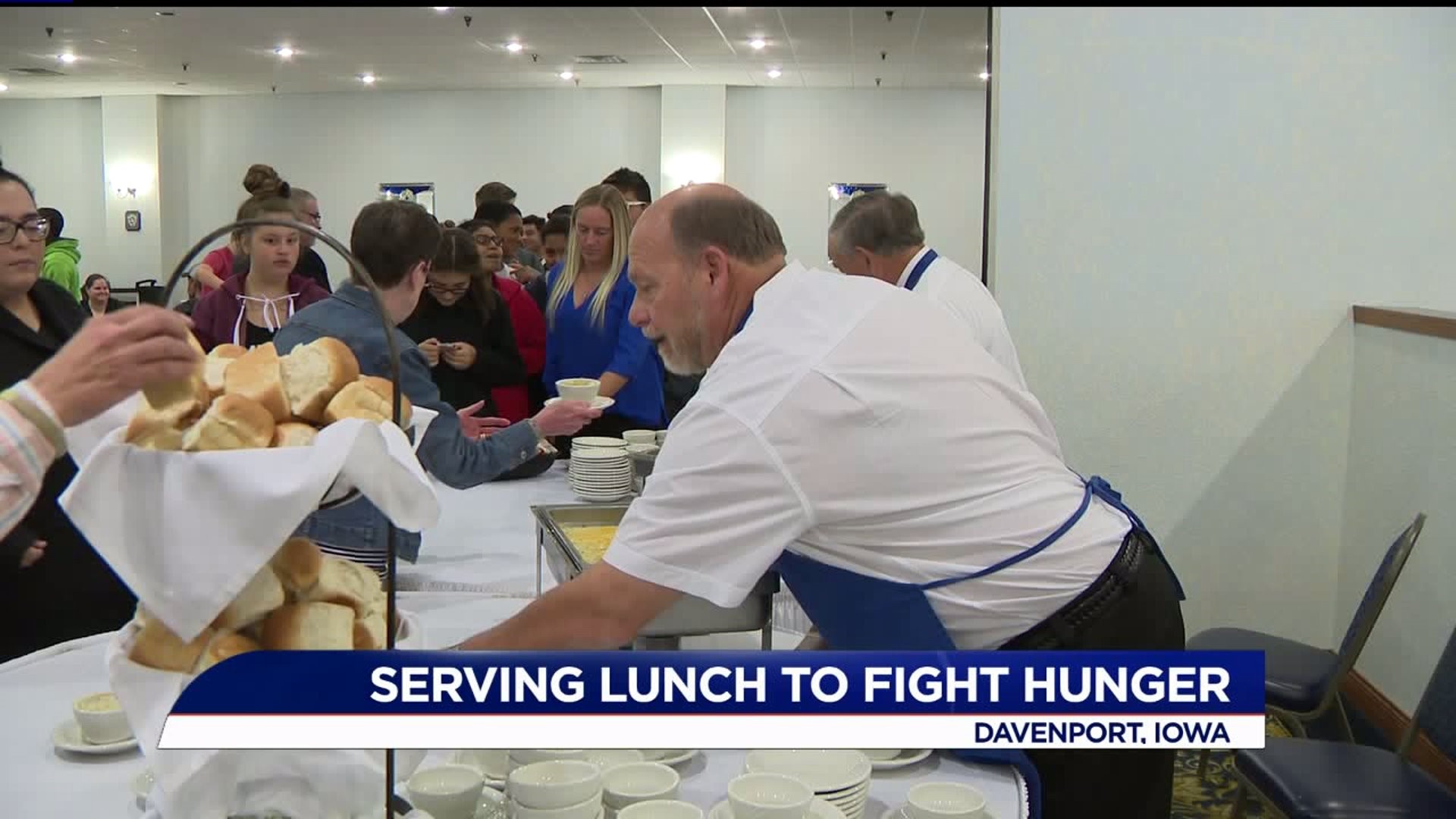 Quad City Mayors serve lunch and raise money