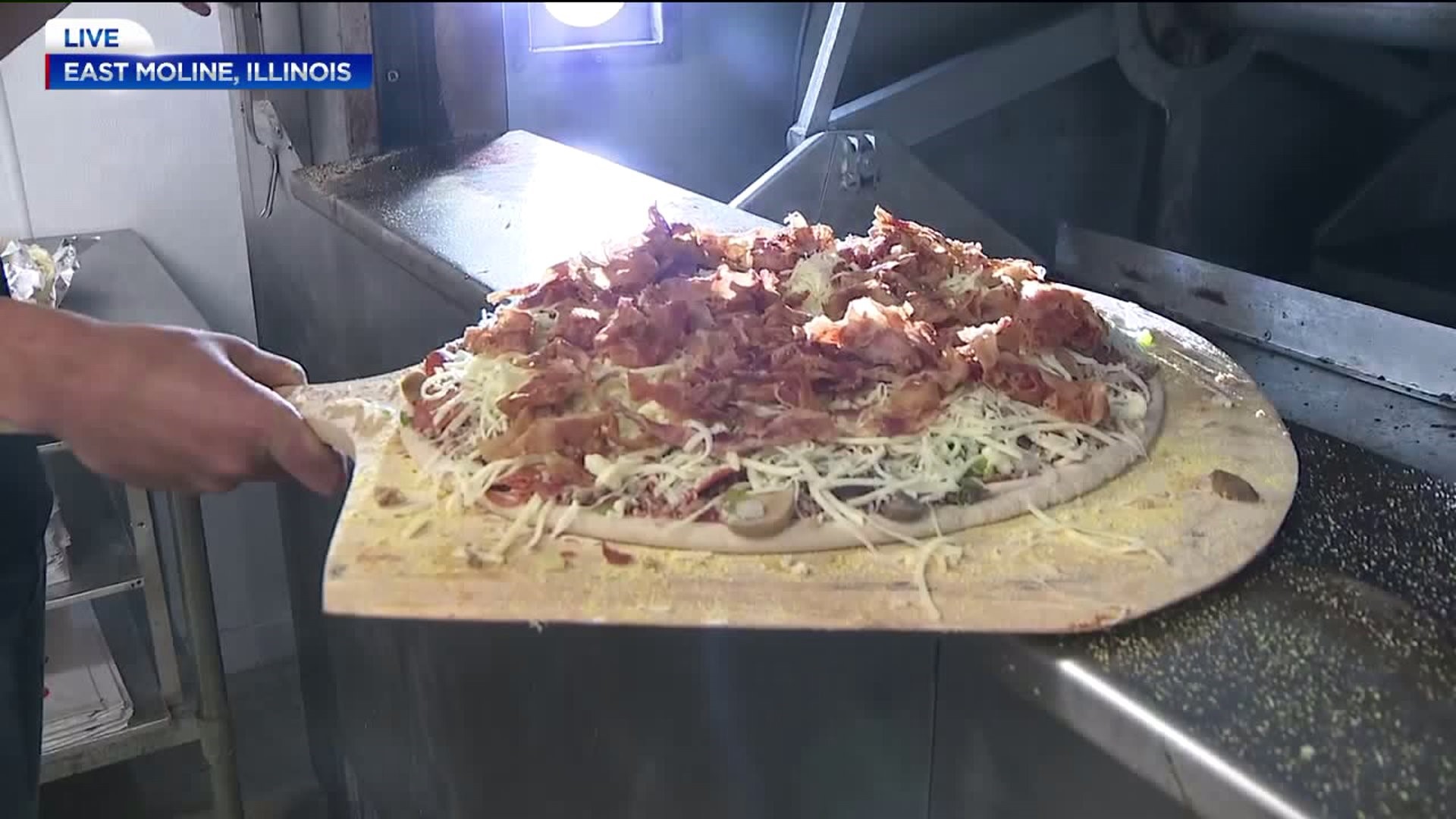 Making pizza during News 8 coffee break