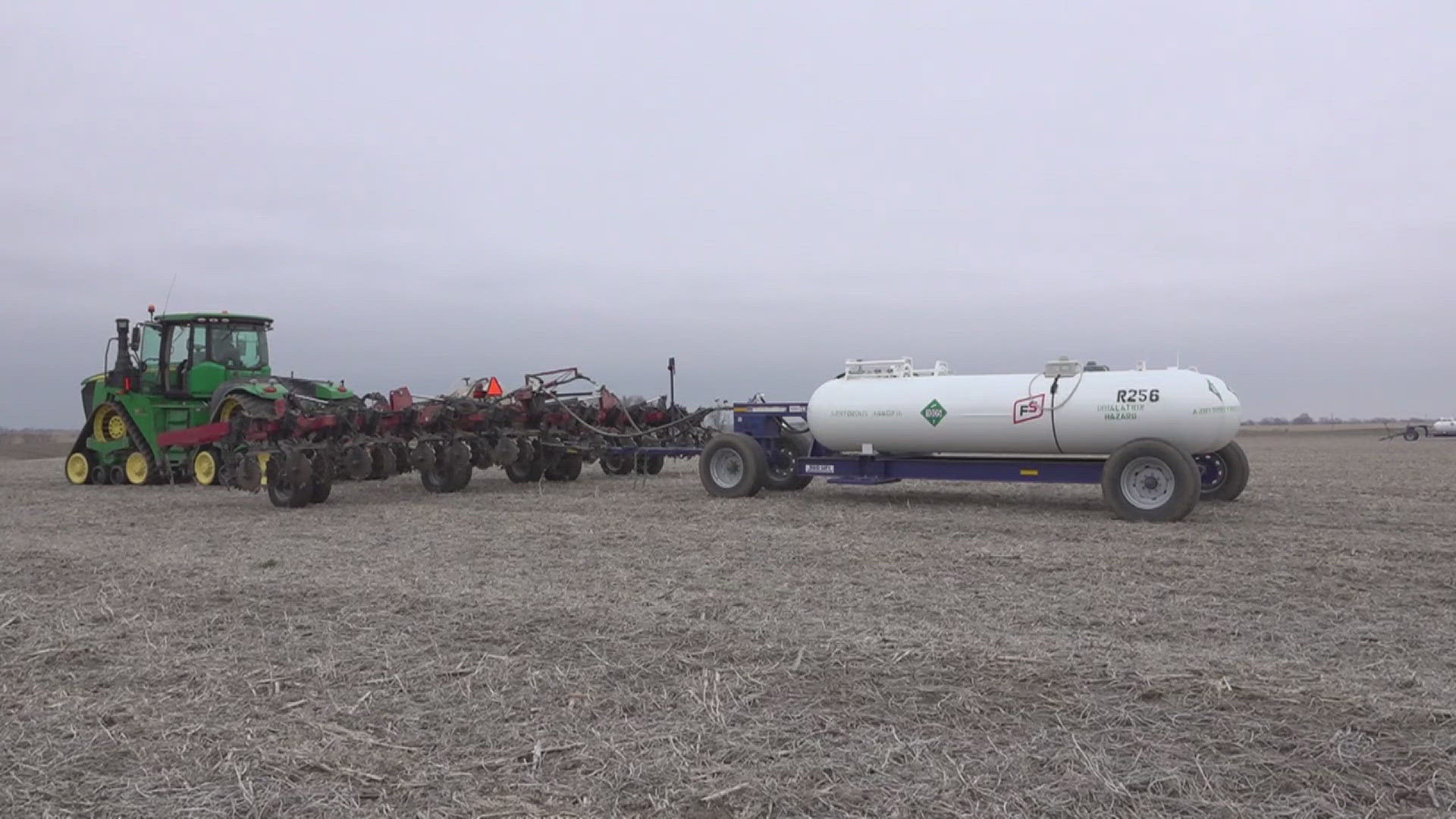 The chemical is transported in big, white tanks. Farmers are asking people to be cautious of slow-moving farm vehicles when driving.