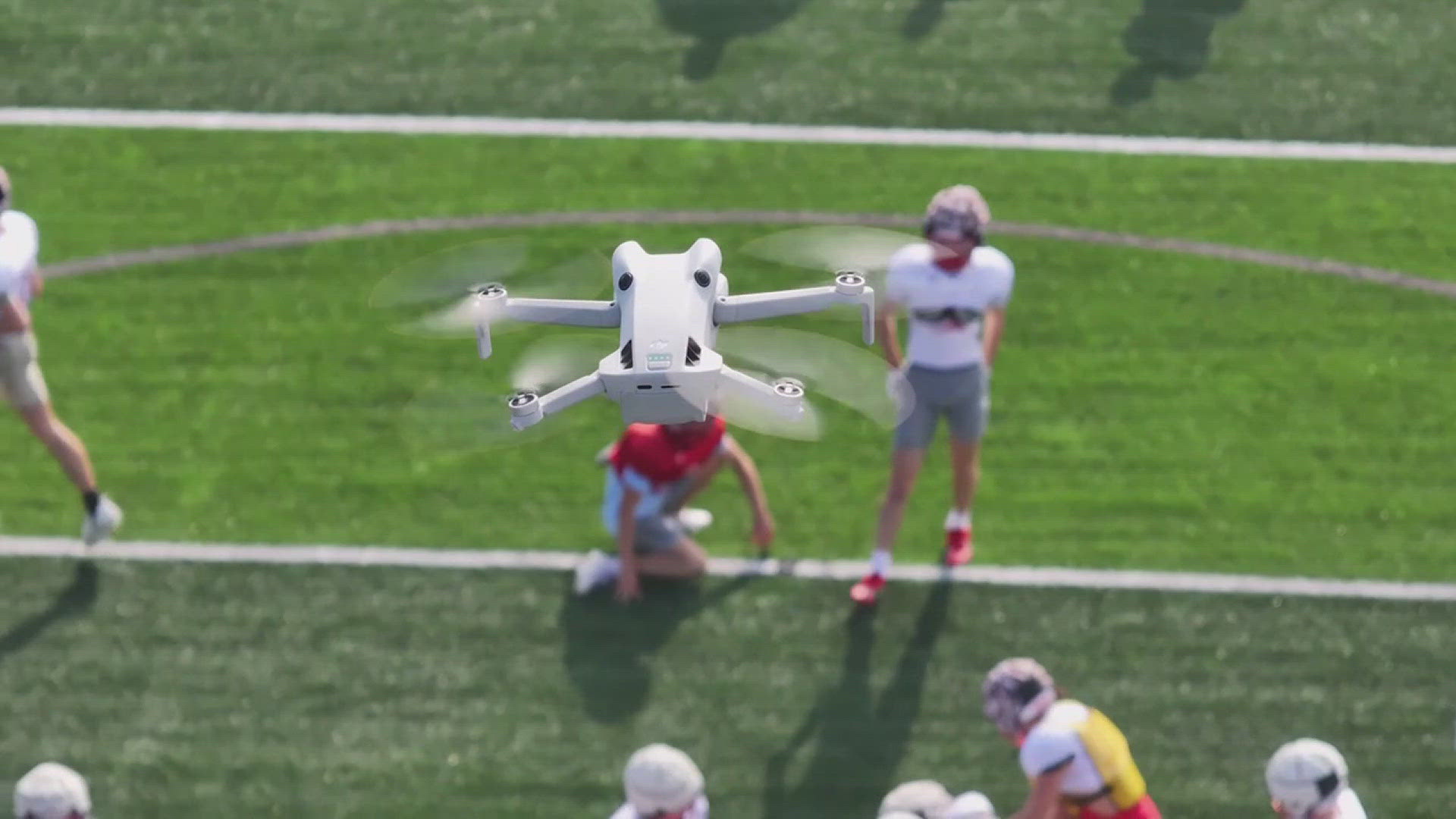 High School Football teams are using new technology to record practices and game. Drones give them a better view and ways to teach their football players.