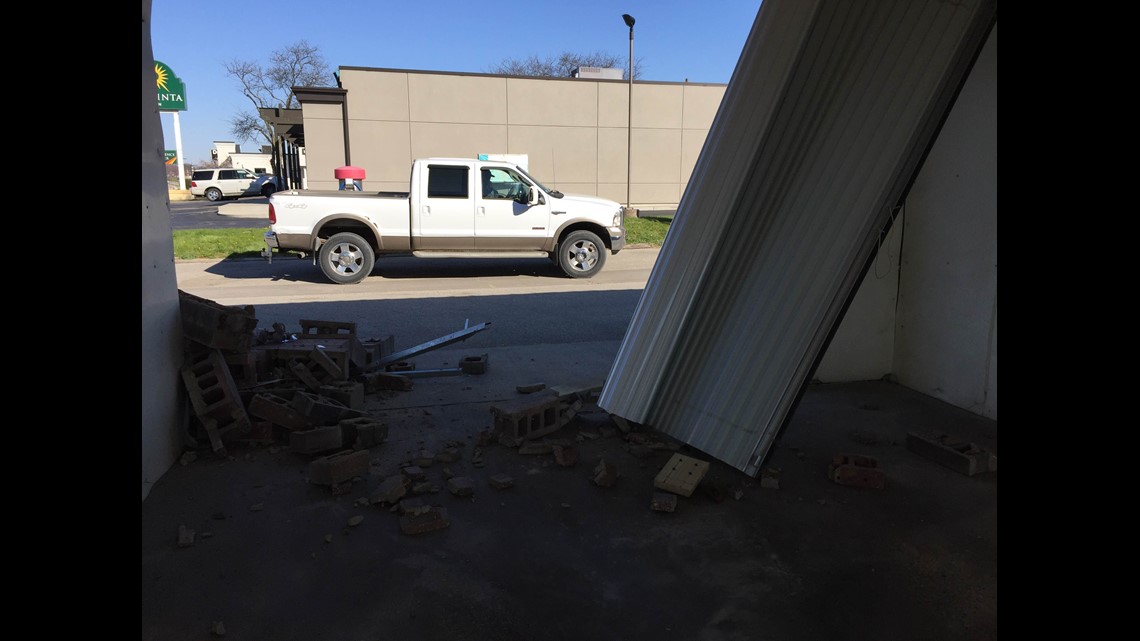 Driver damaged Davenport car wash exterior, doors