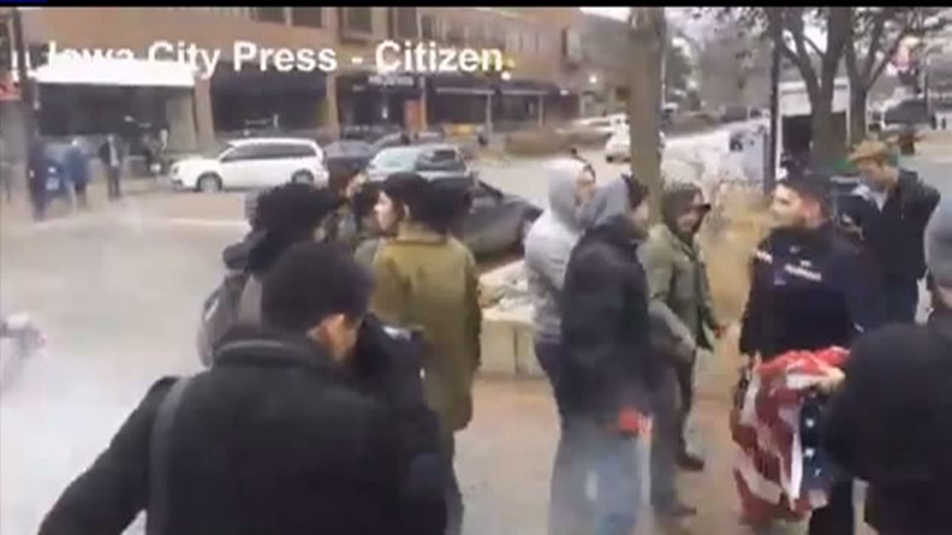 Protesters burn flags in Iowa City