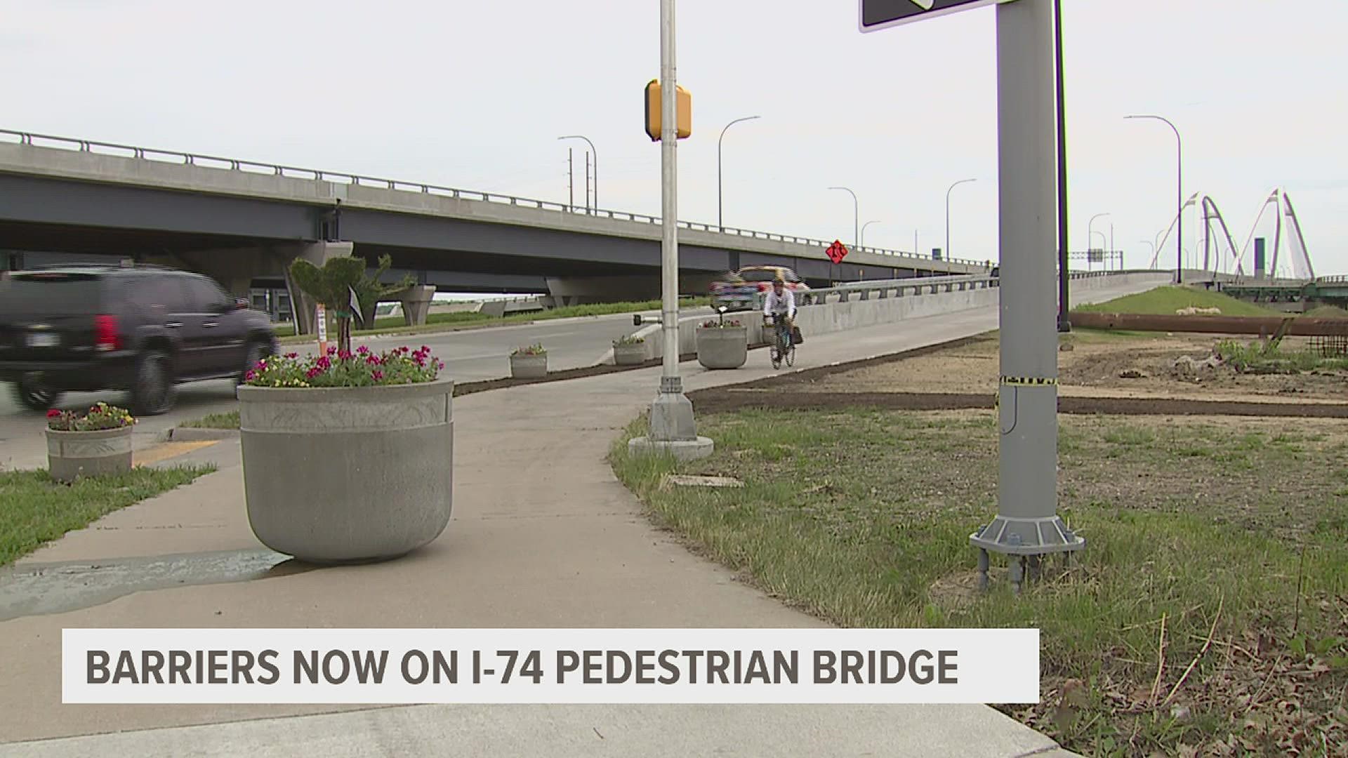 The Iowa Department of Transportation, Bettendorf and Moline are installing barriers to the I-74 bike path while a permanent safety solution is being determined.