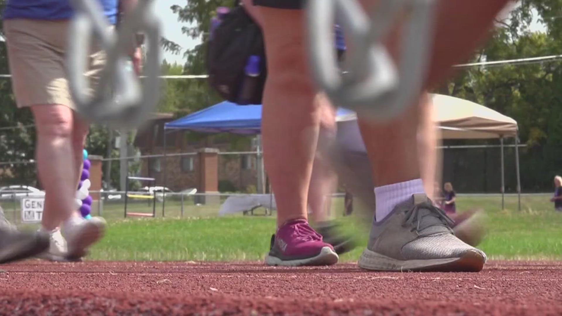 The group is considering combining walks in Iowa and Illinois next year to create a larger and more united support system for the community.