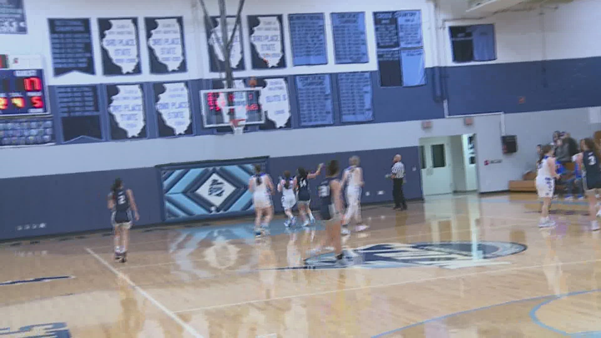Check out this freaking awesome nearly-half-court shot!