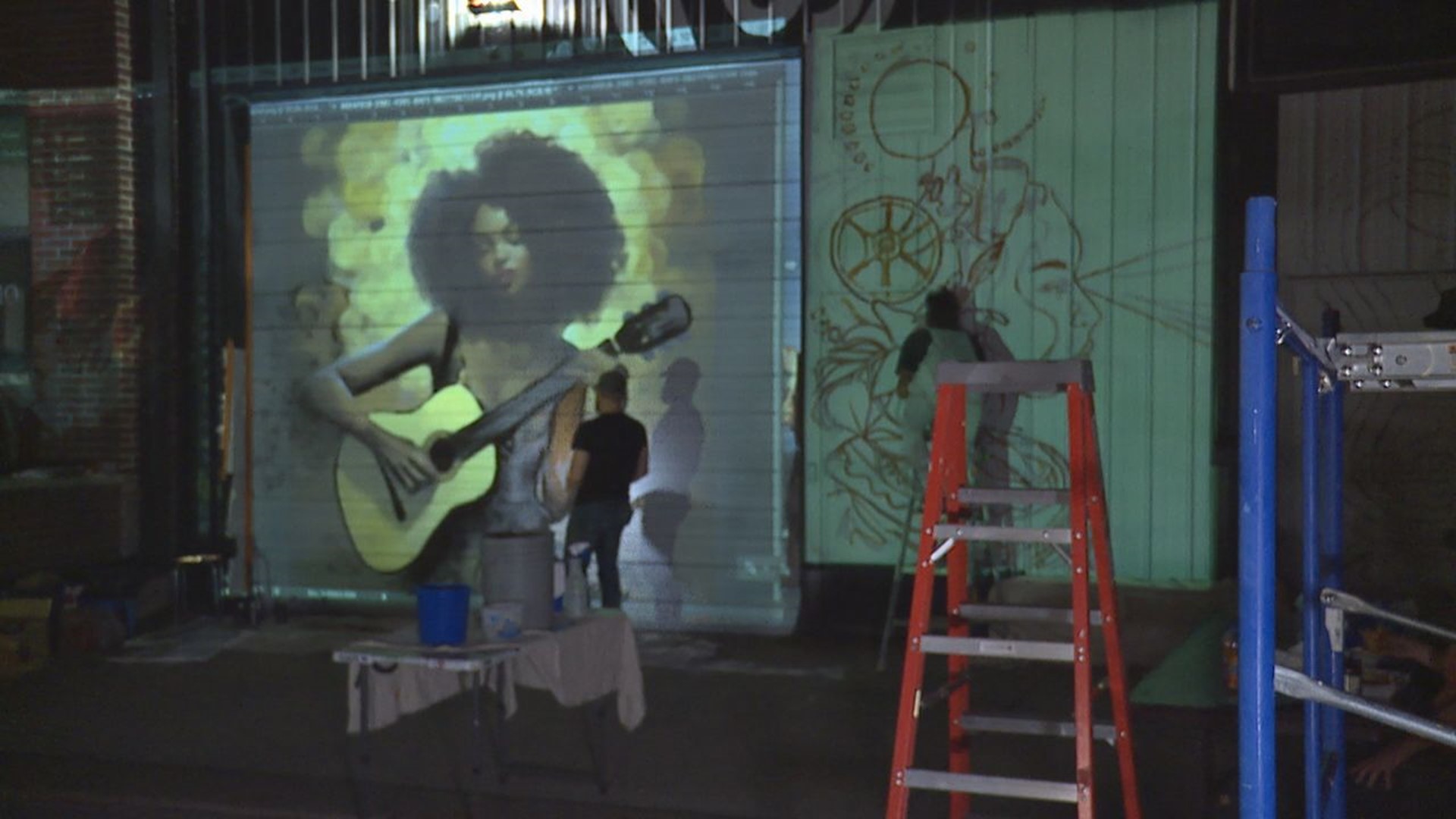 As part of the culture festival, five artists are being featured in the public work off E. 2nd Street.