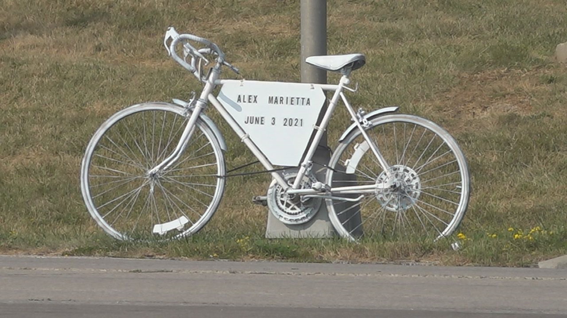 Two years later, family and friends remember Alex Marietta with an anonymously donated 'ghost bike,' placed where the accident happened on Kimberly Road.