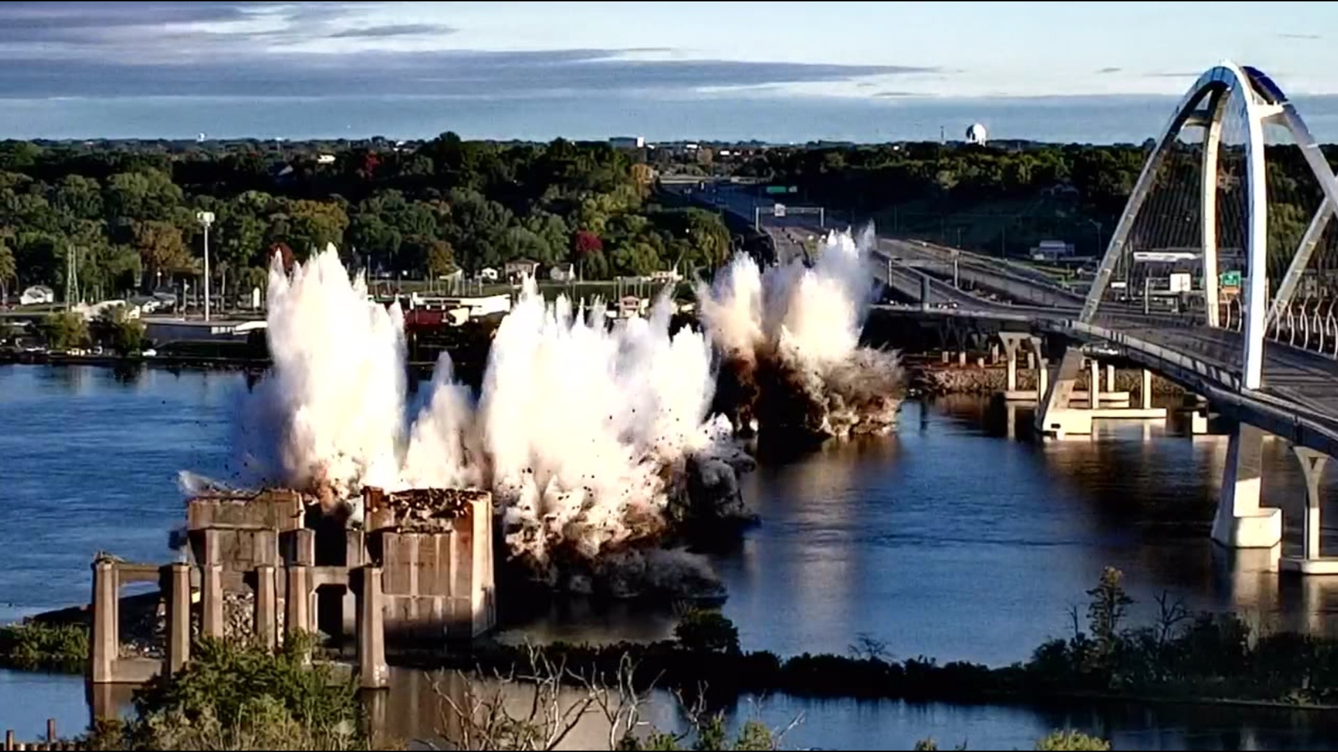 Iowa DOT crews imploded 3 piers of the old I-74 bridge remaining in the Mississippi River on Sunday, Oct. 15, 2023.
