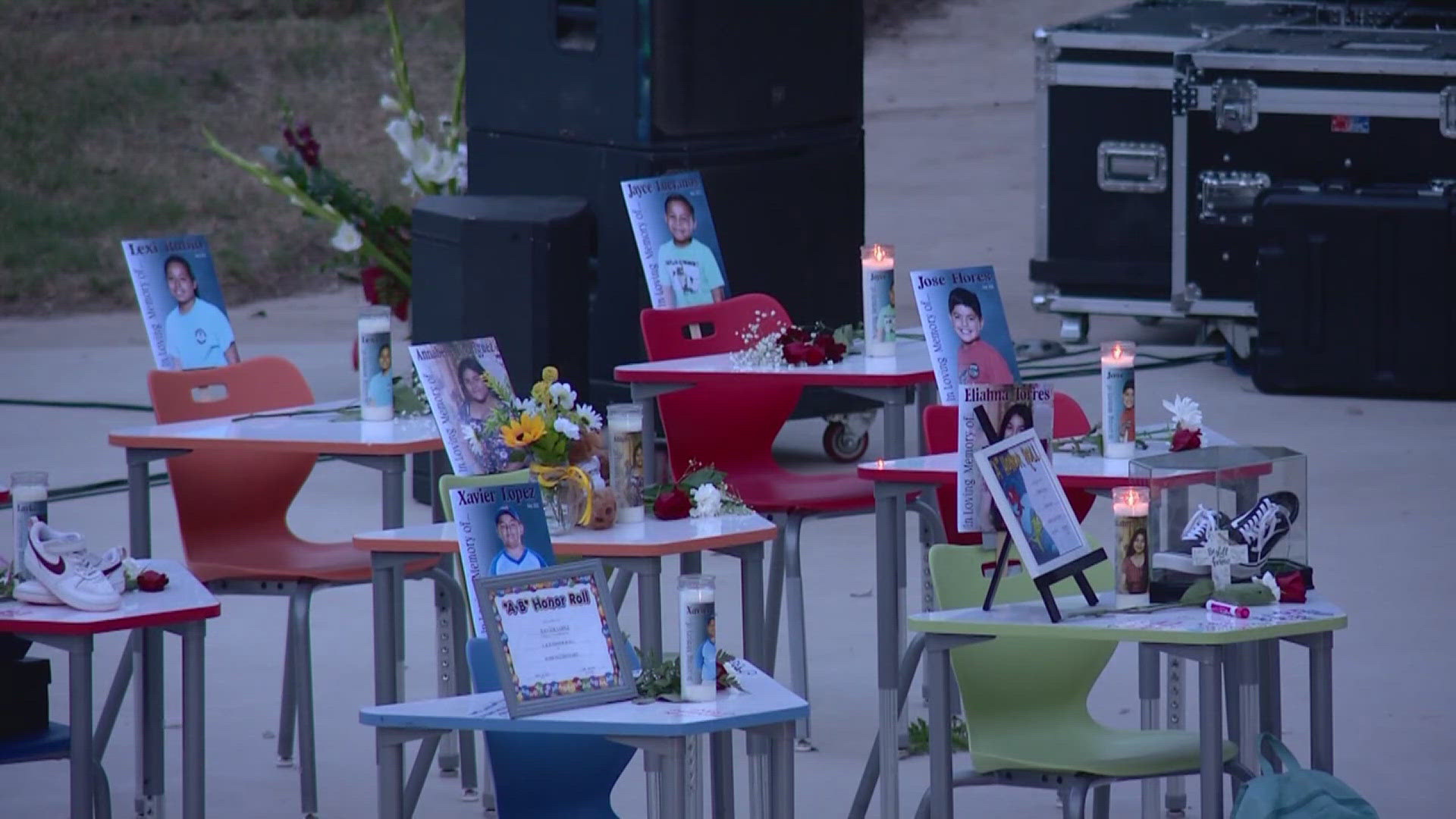 At least 100 people came out for the event in a local park, with photos, flowers and other sentimental items forming a memorial. 