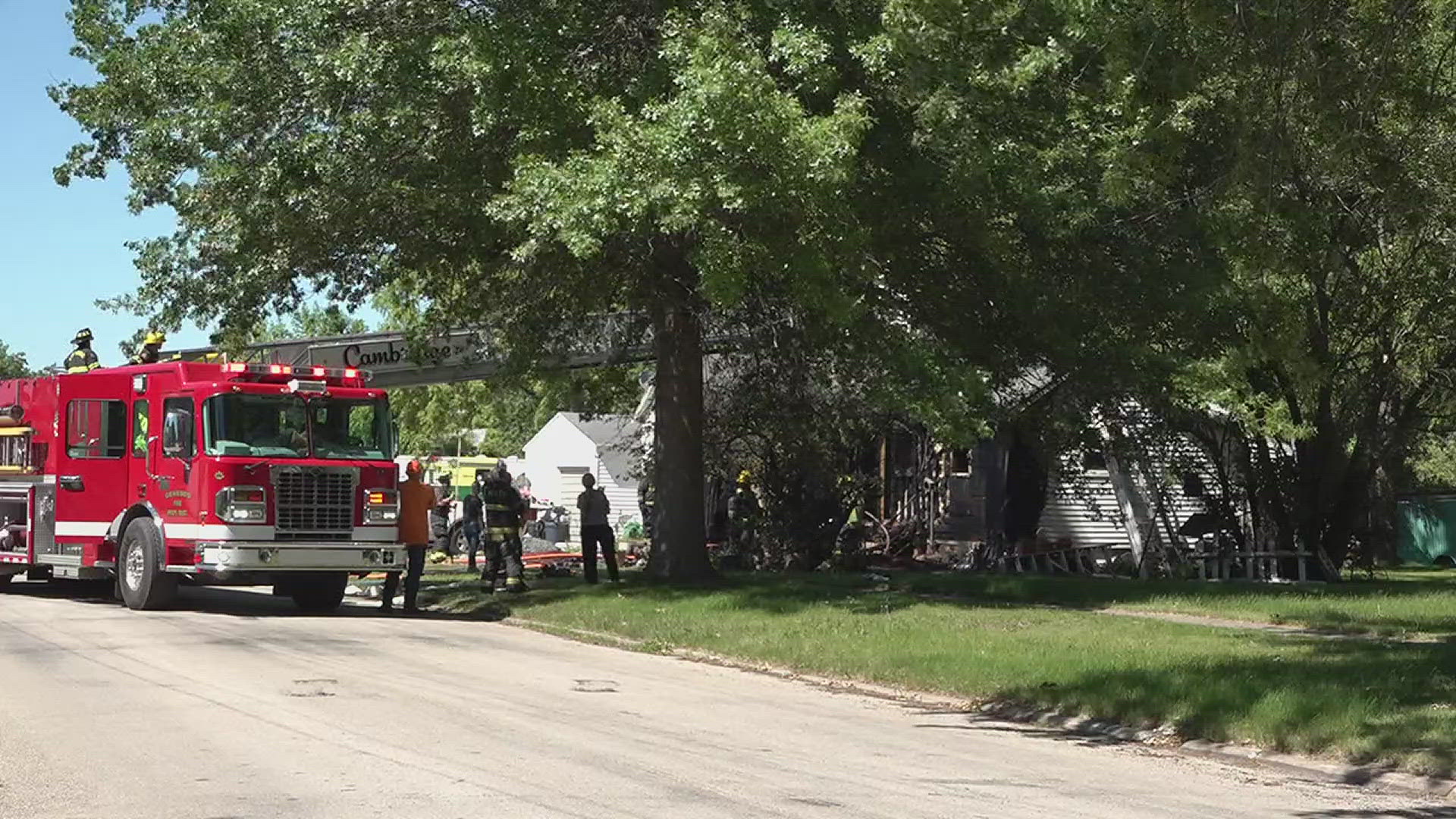 A caller reported the house on fire, along with downed powerlines nearby.