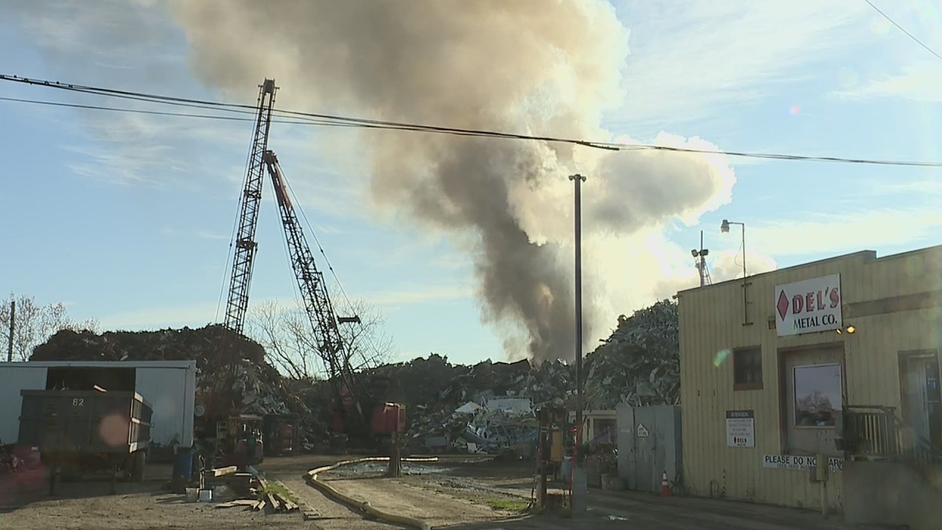 The fire was contained to just the scrap metal and did not impact any surrounding businesses.